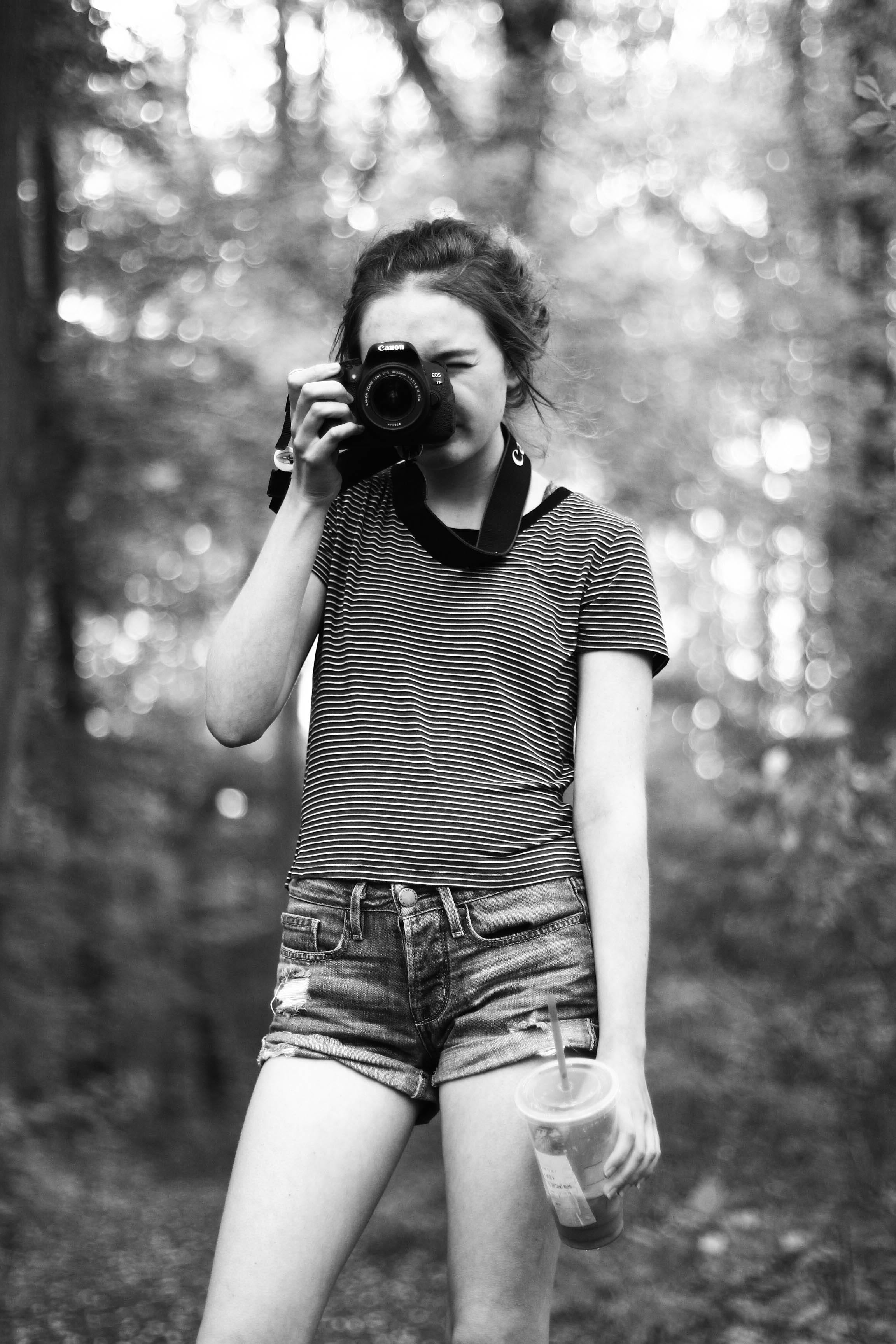 person, plant, girl, accessory, face, outdoors, activity, focus on foreground, woman, leisure activity, female, three quarter length, forest, one person, Phone HD Wallpaper