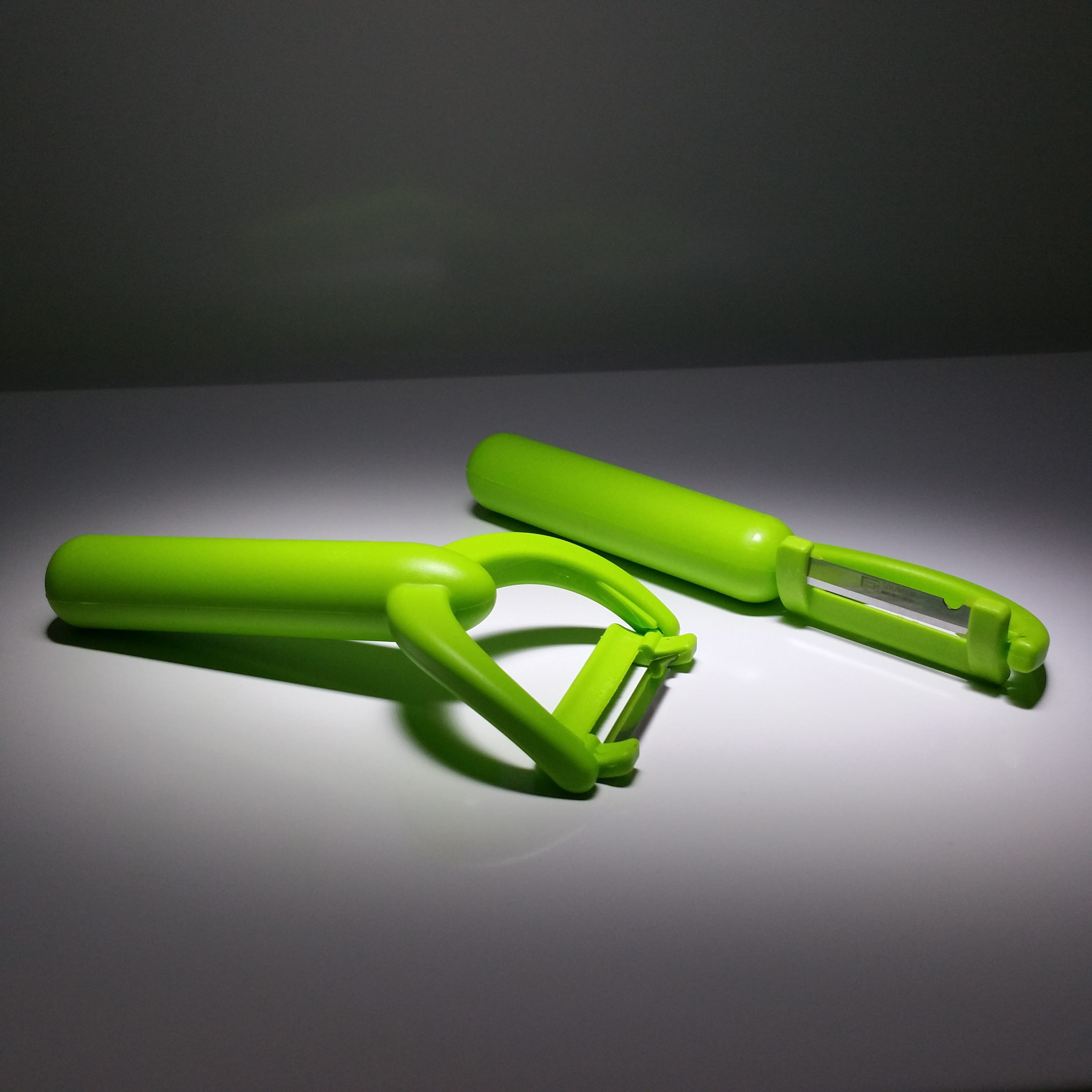 copy space, Vegetable Peeler, green, table, gray, close-up, still life, illuminated, colored background, indoors, medium group of objects, connection, no people, Phone HD Wallpaper