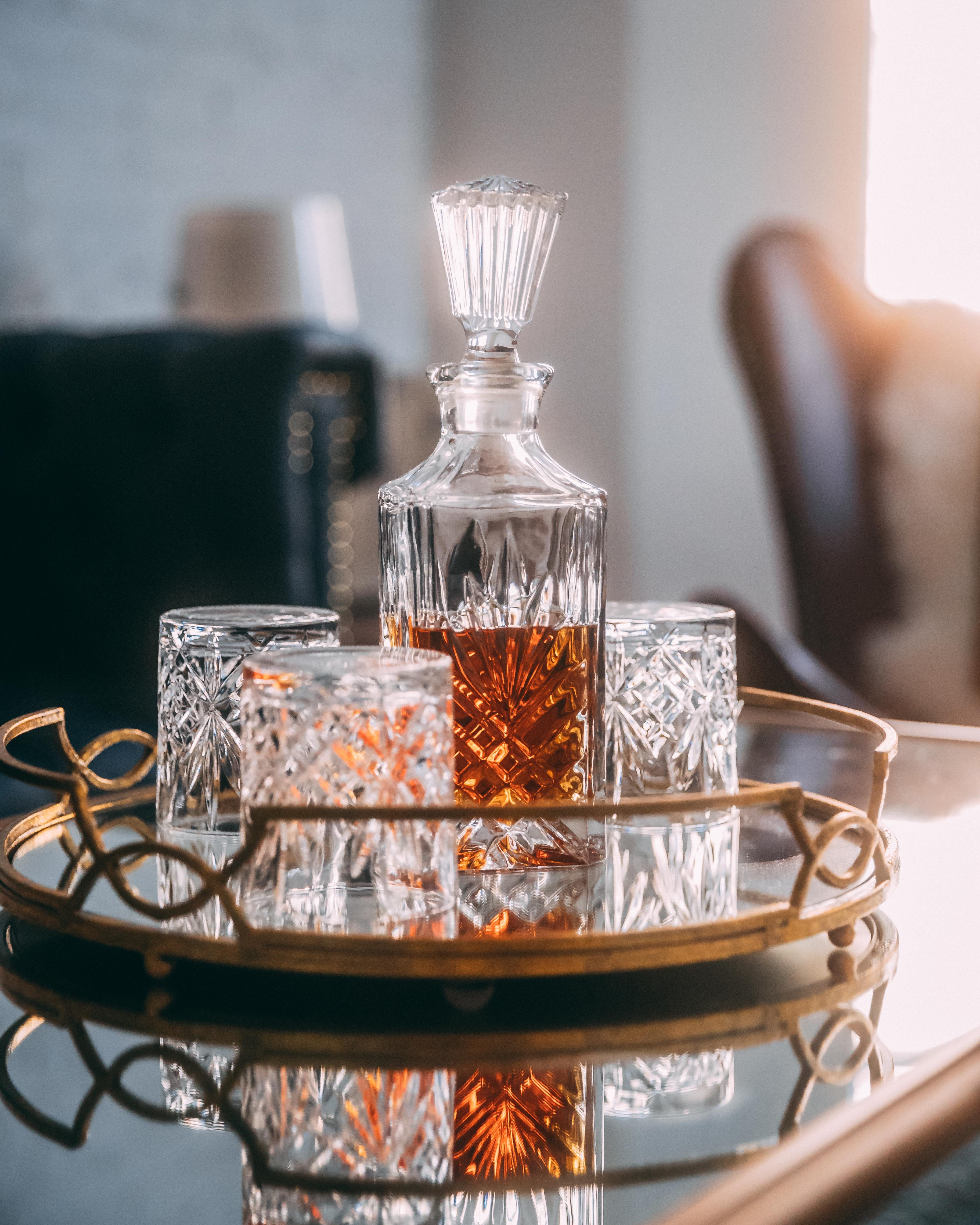 container, bottle, photography, #whiskey, drink, human, person, one person, table, human body part, decanter, home decor, #sunset, focus, #cocktail, metal, Phone HD Wallpaper