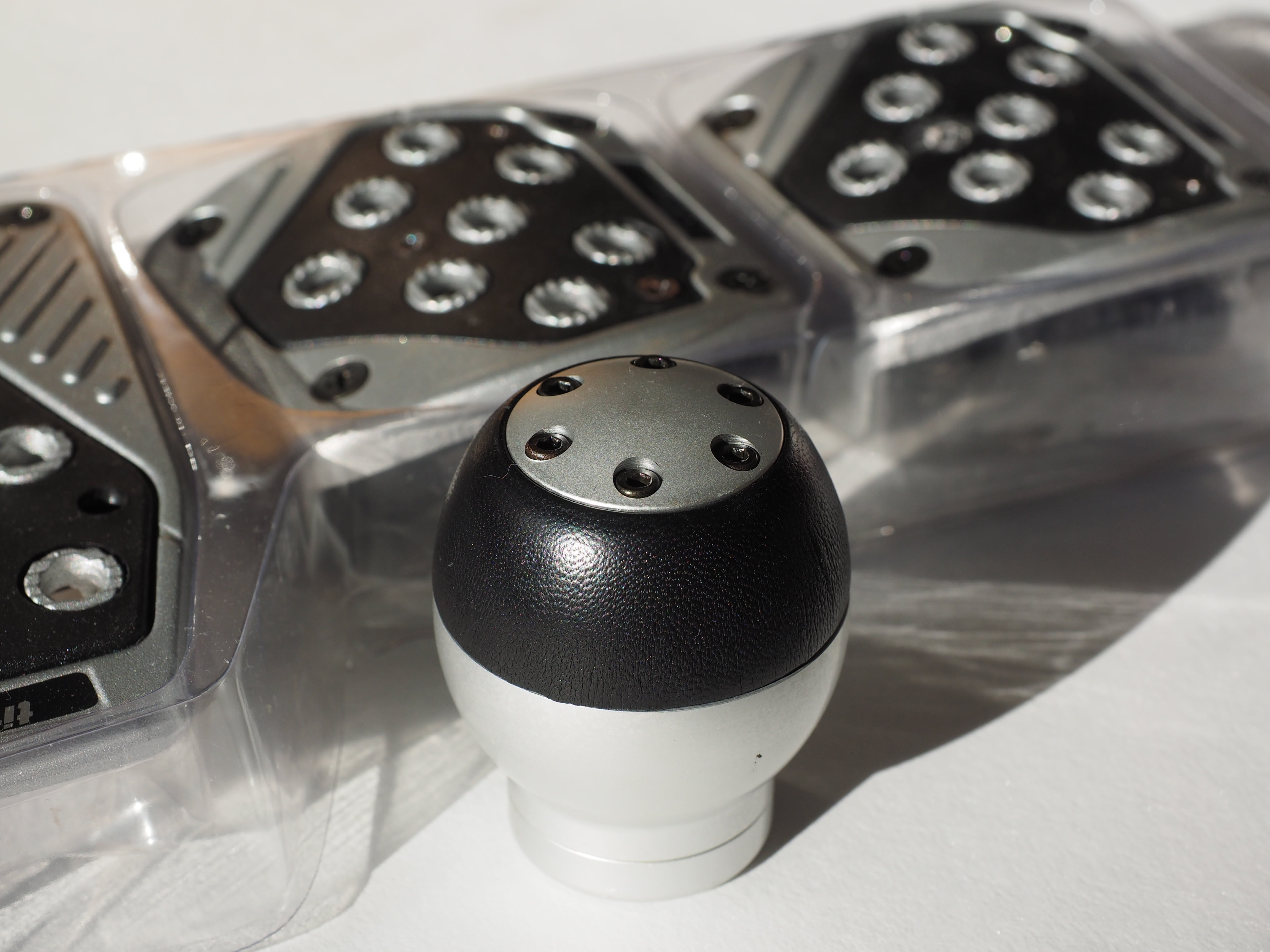 gear shift knob, auto, table, tuning set, salt - seasoning, studio shot, silver colored, no people, single object, pedal pads, black color, indoors, gas pedal kit, HD Wallpaper