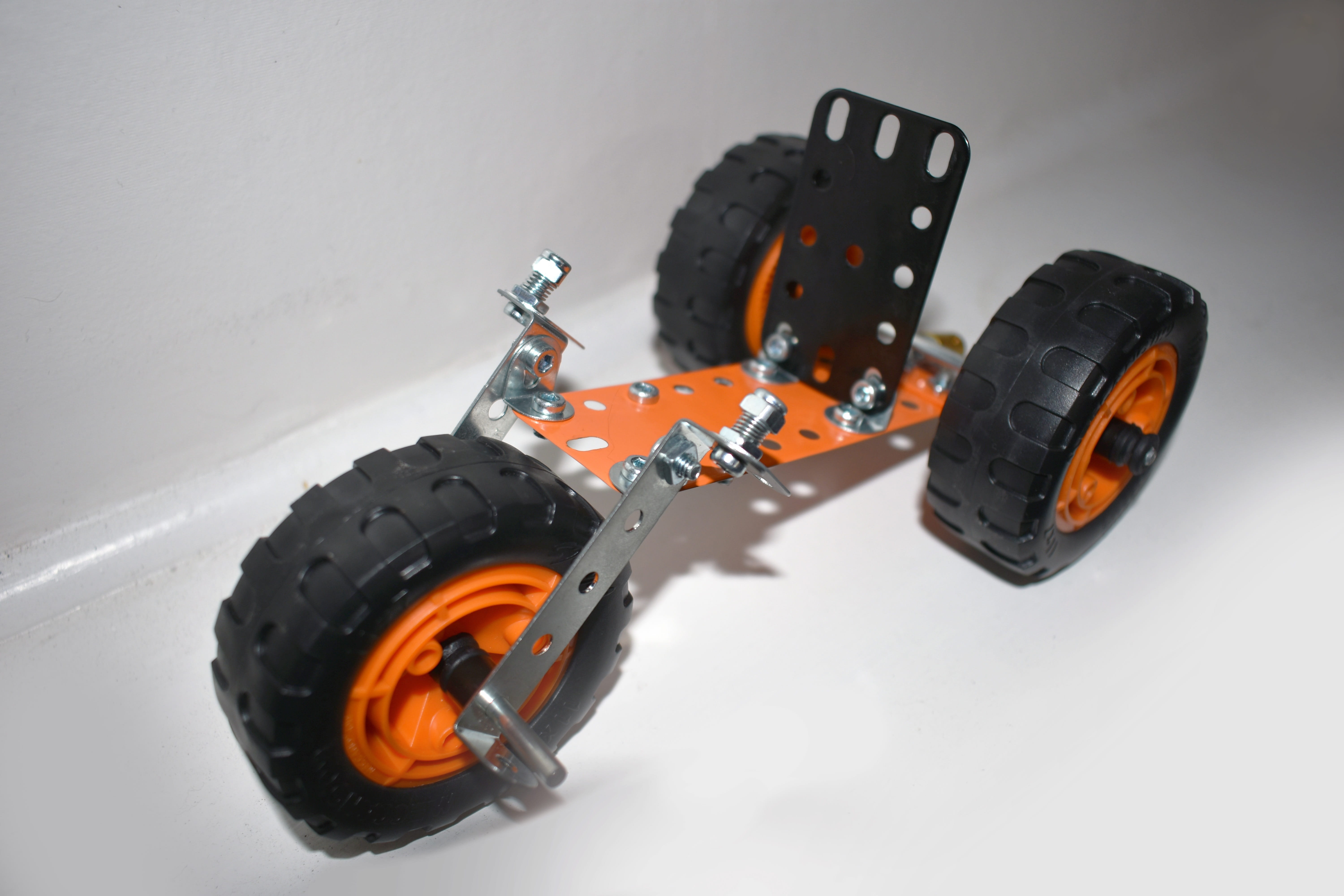 machinery, design, puzzle, activity, nut, black color, orange color, bike, high angle view, no people, indoors, road, lego, blocks, white background, mode of transportation, HD Wallpaper