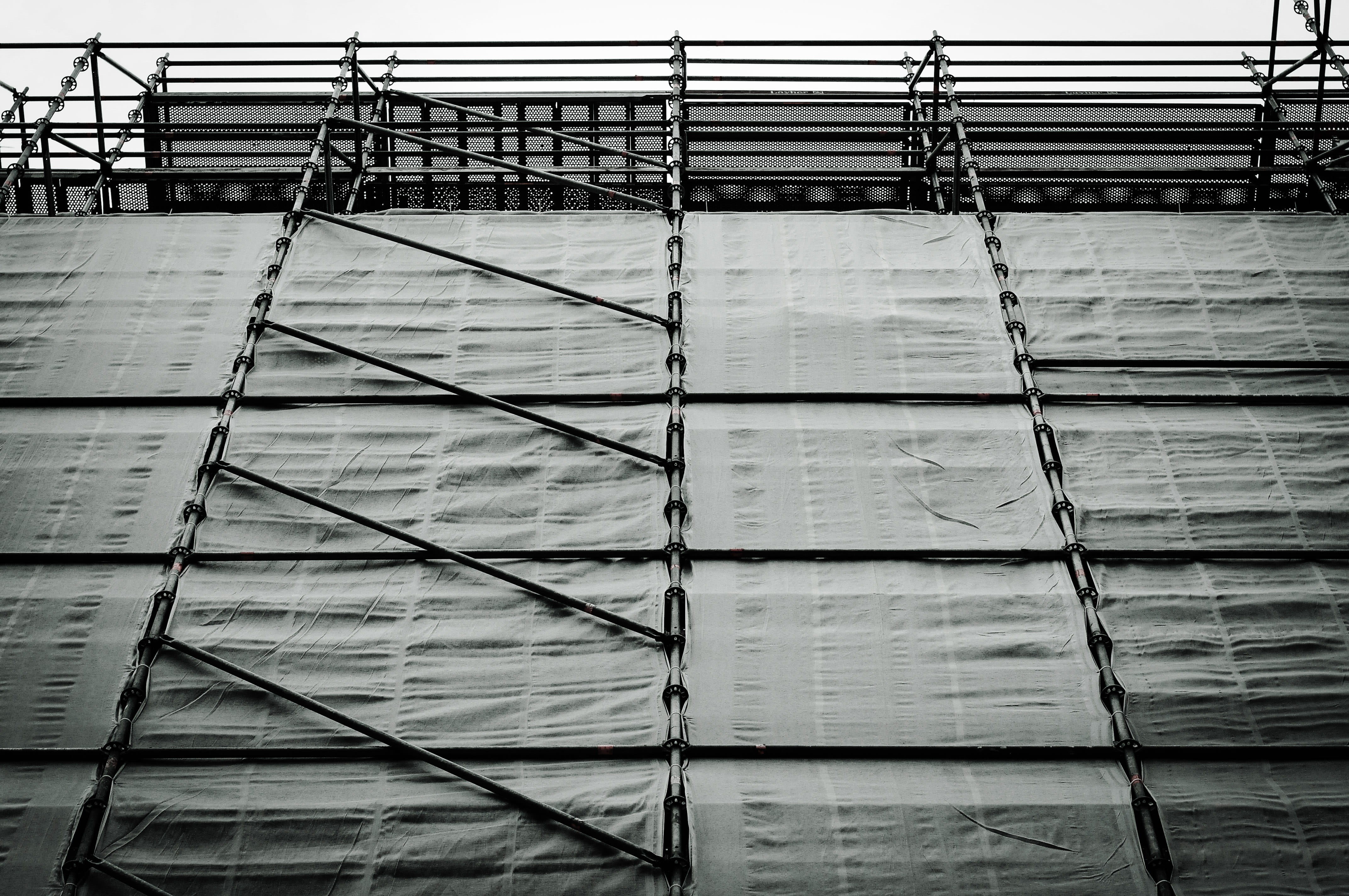construction industry, industry, development, construction site, full frame, backgrounds, incomplete, renovation, day, sky, scaffolding, low angle view, HD Wallpaper