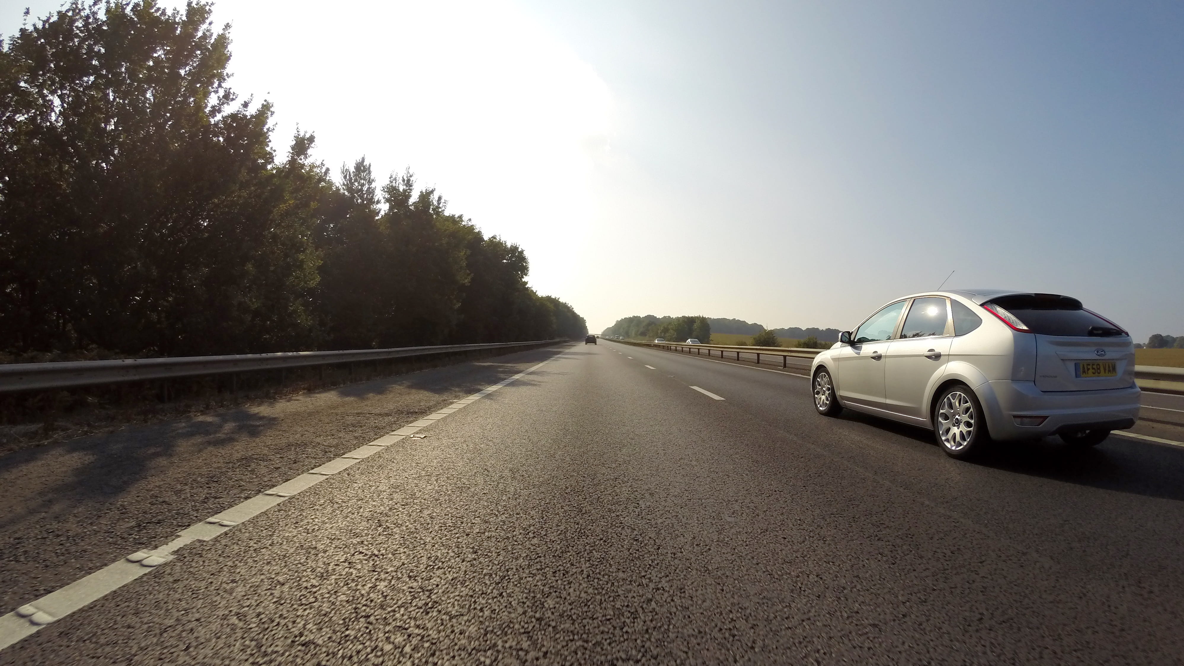 hatchback, sunlight, vacation, pavement, focus, 4K, motion, landscape, sky, drive, street, tree, ford, diminishing perspective, automobile, daylight, automotive, HD Wallpaper