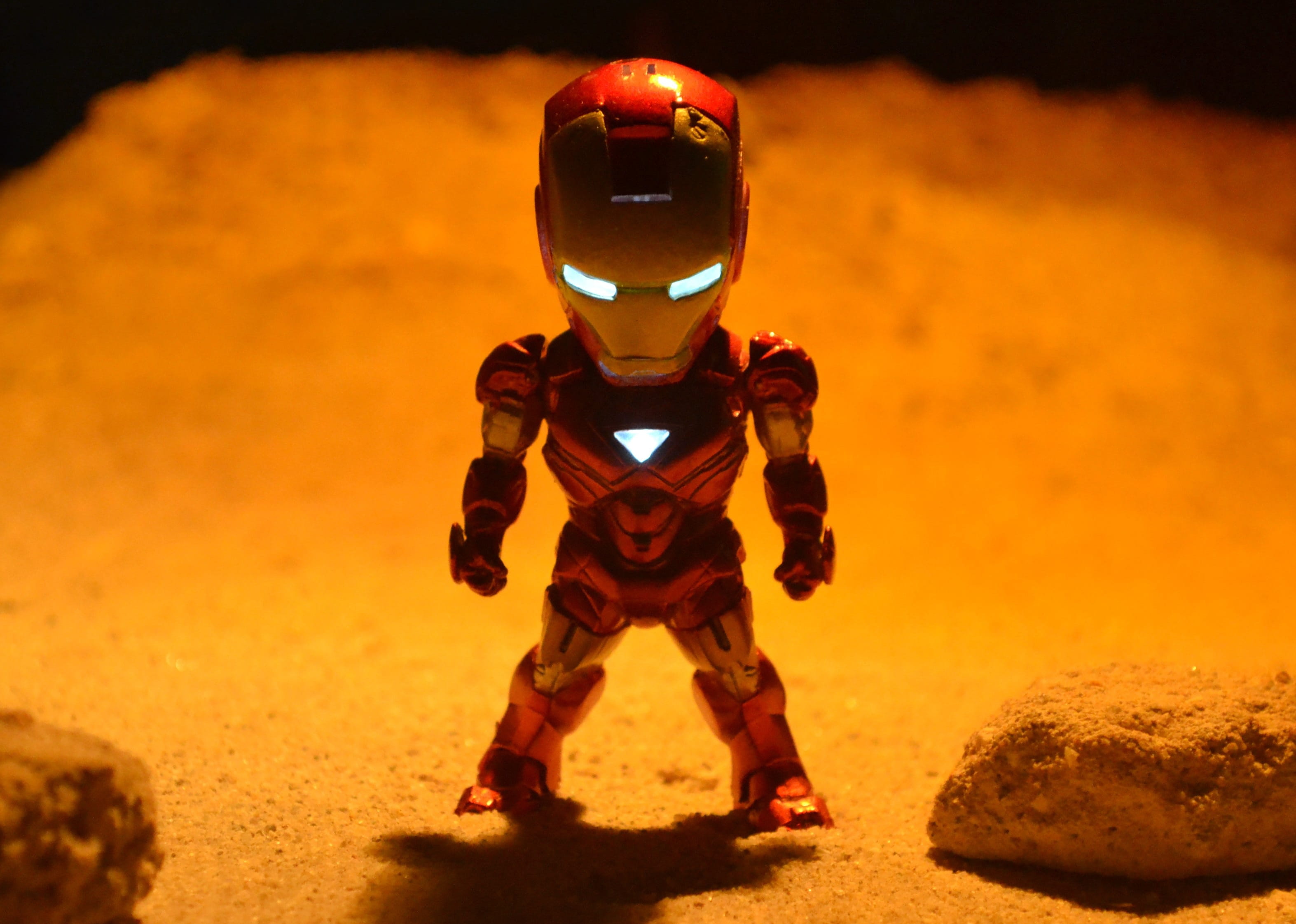 headwear, collectible, sand, iron man, front view, Iron-man, hero, super, figure, robotic, courage, hill, obscured face, military, security, helmet, 2K, HD Wallpaper