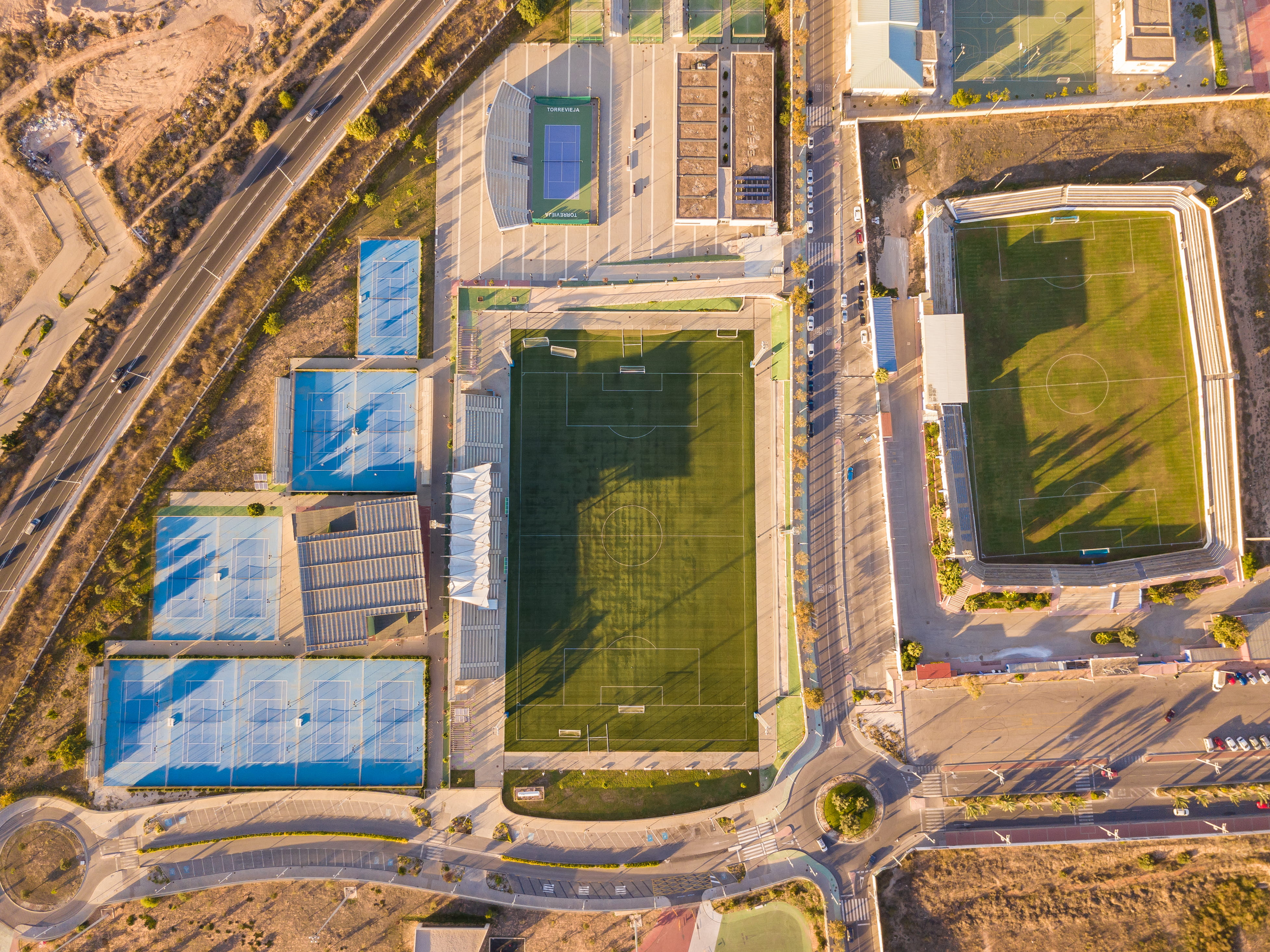 no people, basketball, city, view, sunlight, built structure, day, abandoned, outdoors, building exterior, s, plant, soccer, bird, reflection, fields, stadium, HD Wallpaper