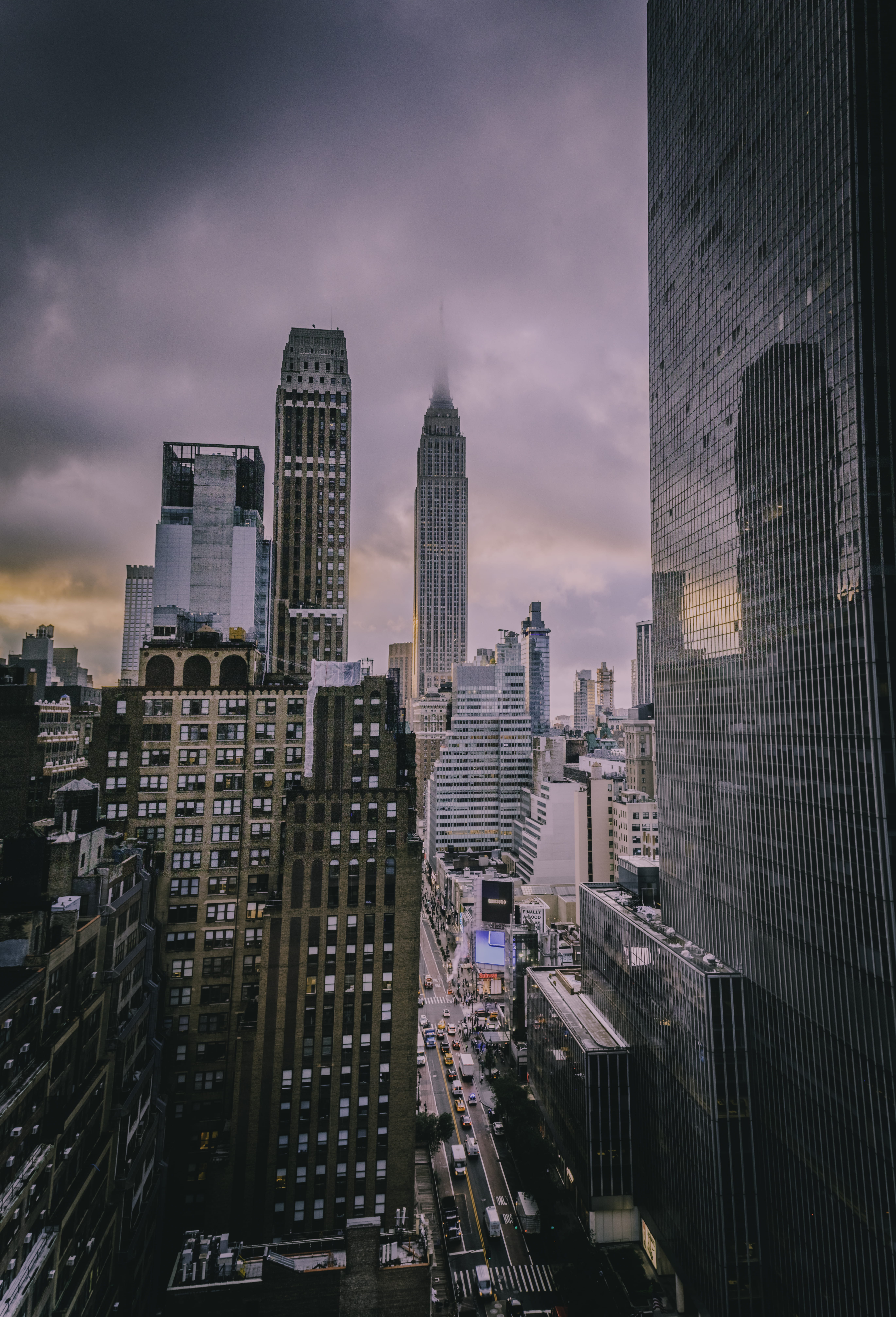 metropolis, no people, outdoors, urban, buildings, landscape, scenery, financial district, dusk, modern, urban skyline, tall - high, road, town, downtown district, Phone HD Wallpaper