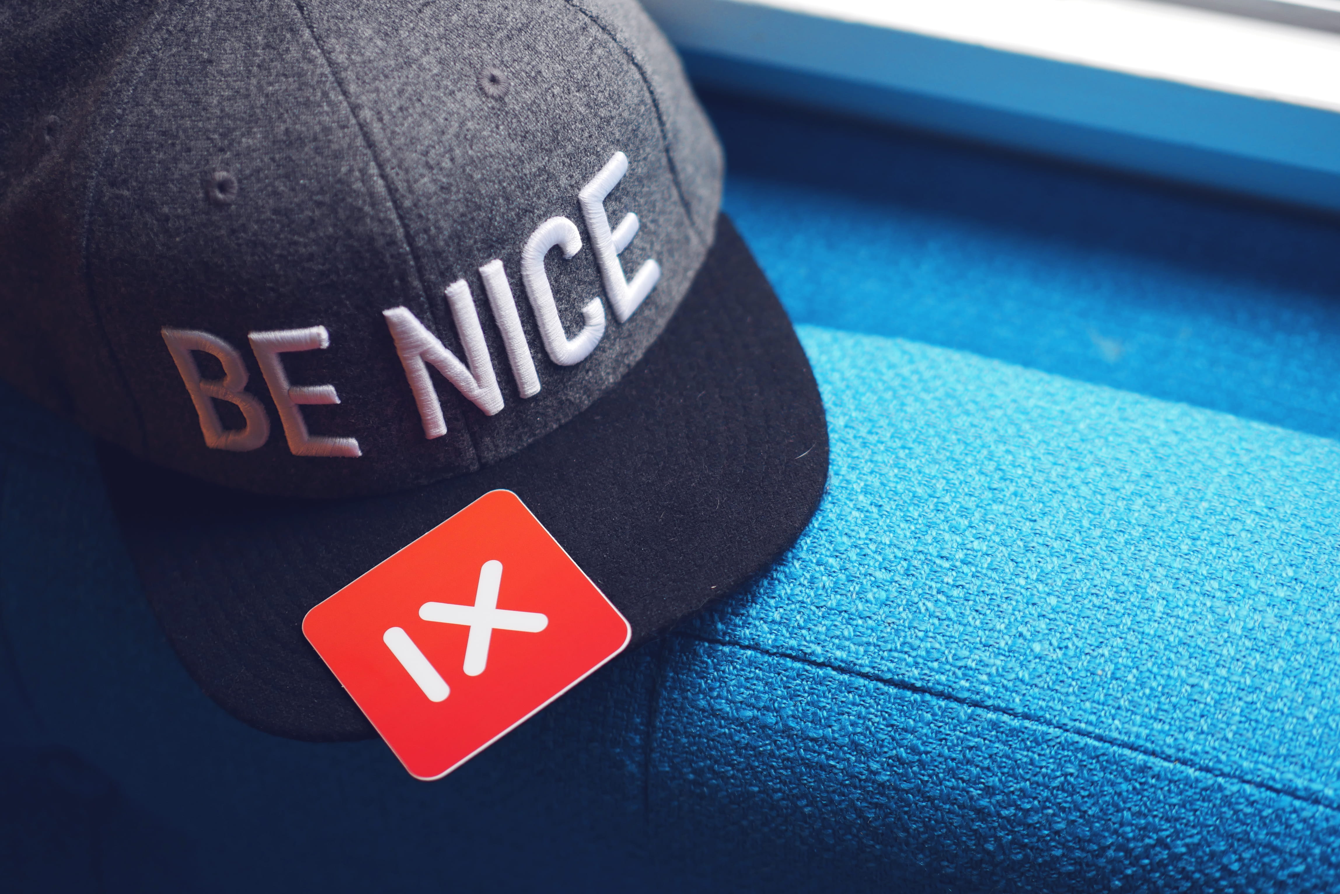 red, no people, close-up, table, high angle view, text, western script, event, sign, 4K, be nice, hat, typography, star shape, blue, celebration, focus on foreground, HD Wallpaper