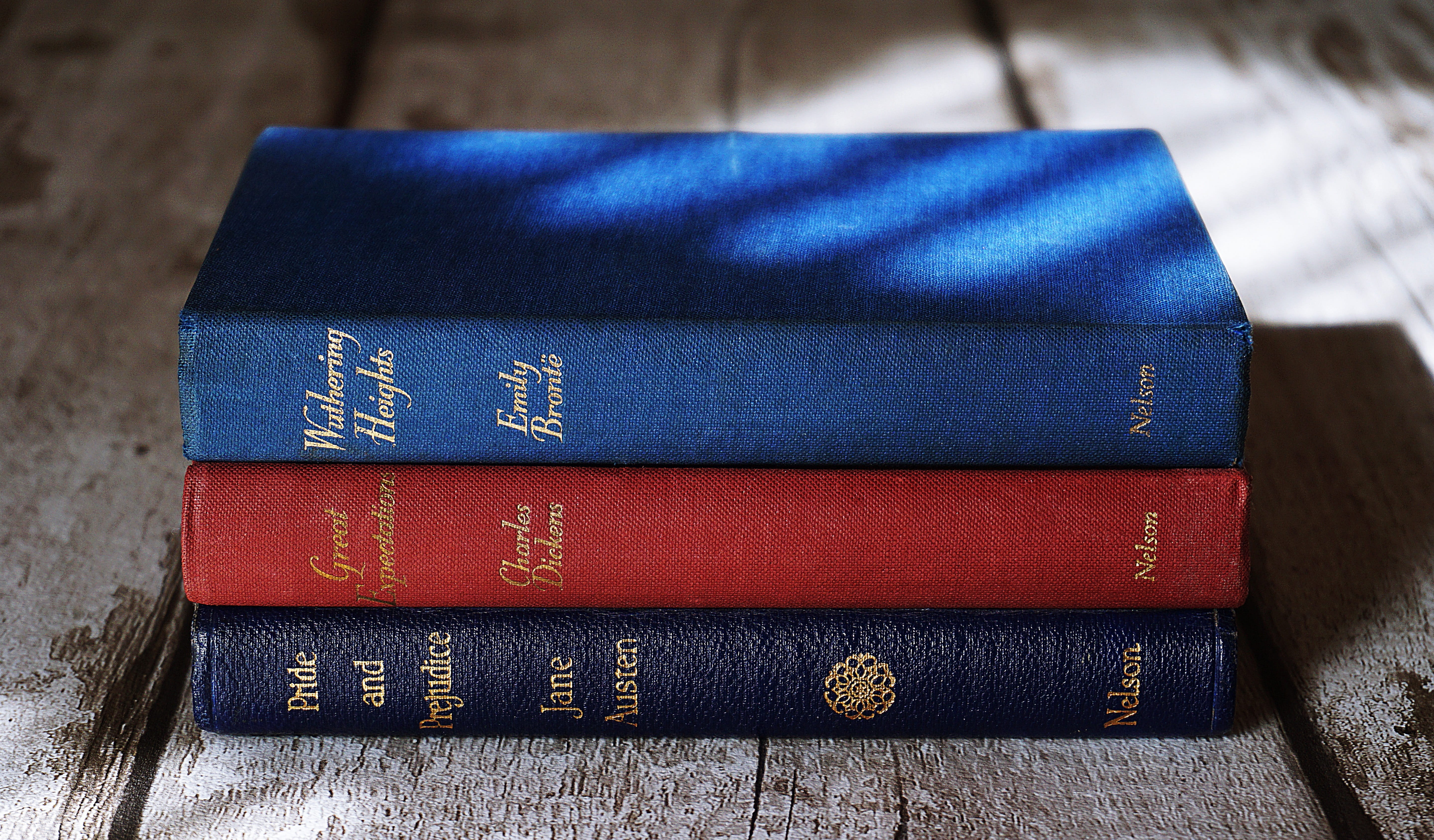 focus on foreground, folded, text, wisdom, 5K, red, stack, no people, book bindings, jane austen, old, close-up, books, wood - material, three, study, HD Wallpaper