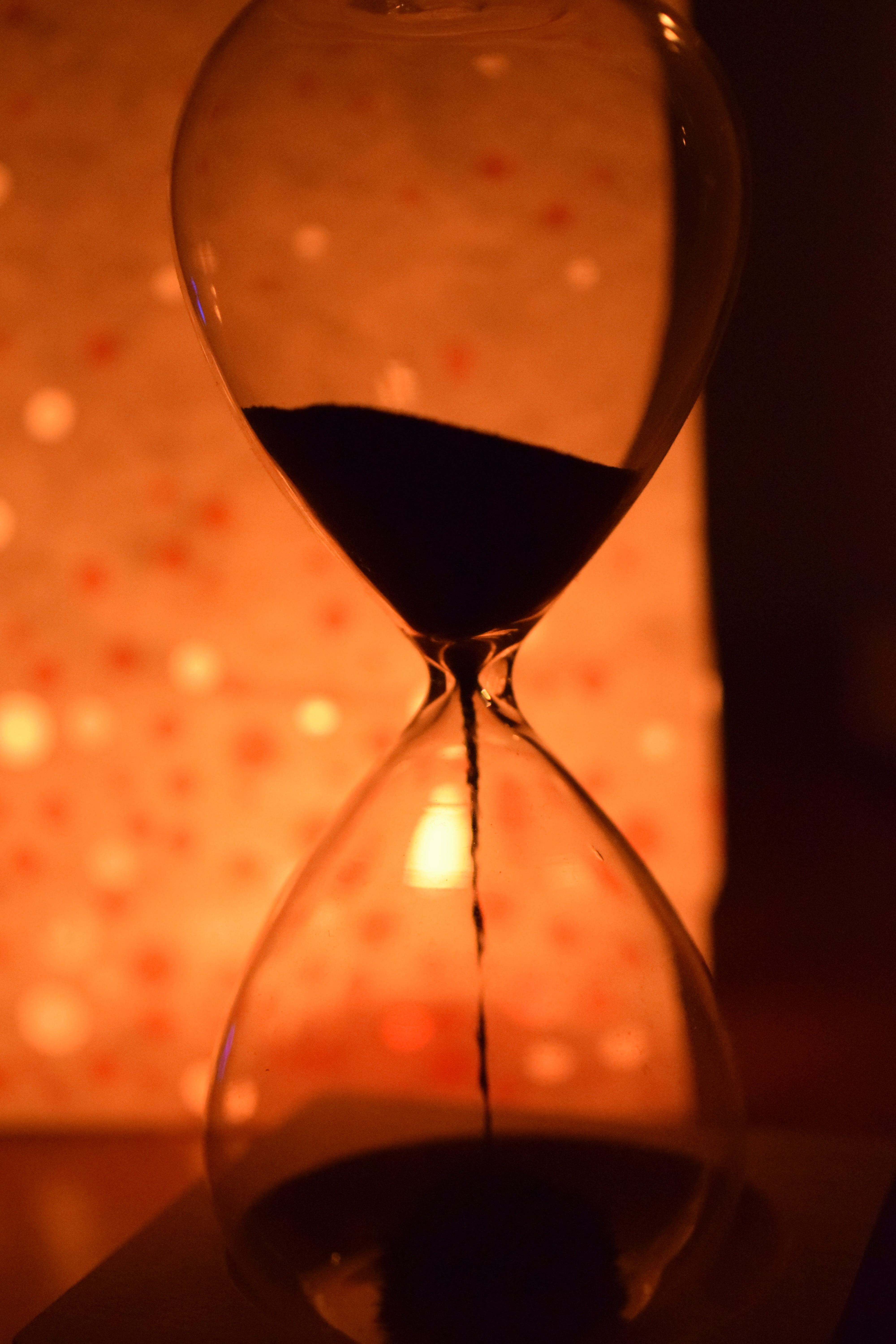 time, hour, night, hourglass, nature, transient, light, transparent, close-up, drink, indoors, sand, single object, pouring, focus on foreground, wineglass, Phone HD Wallpaper