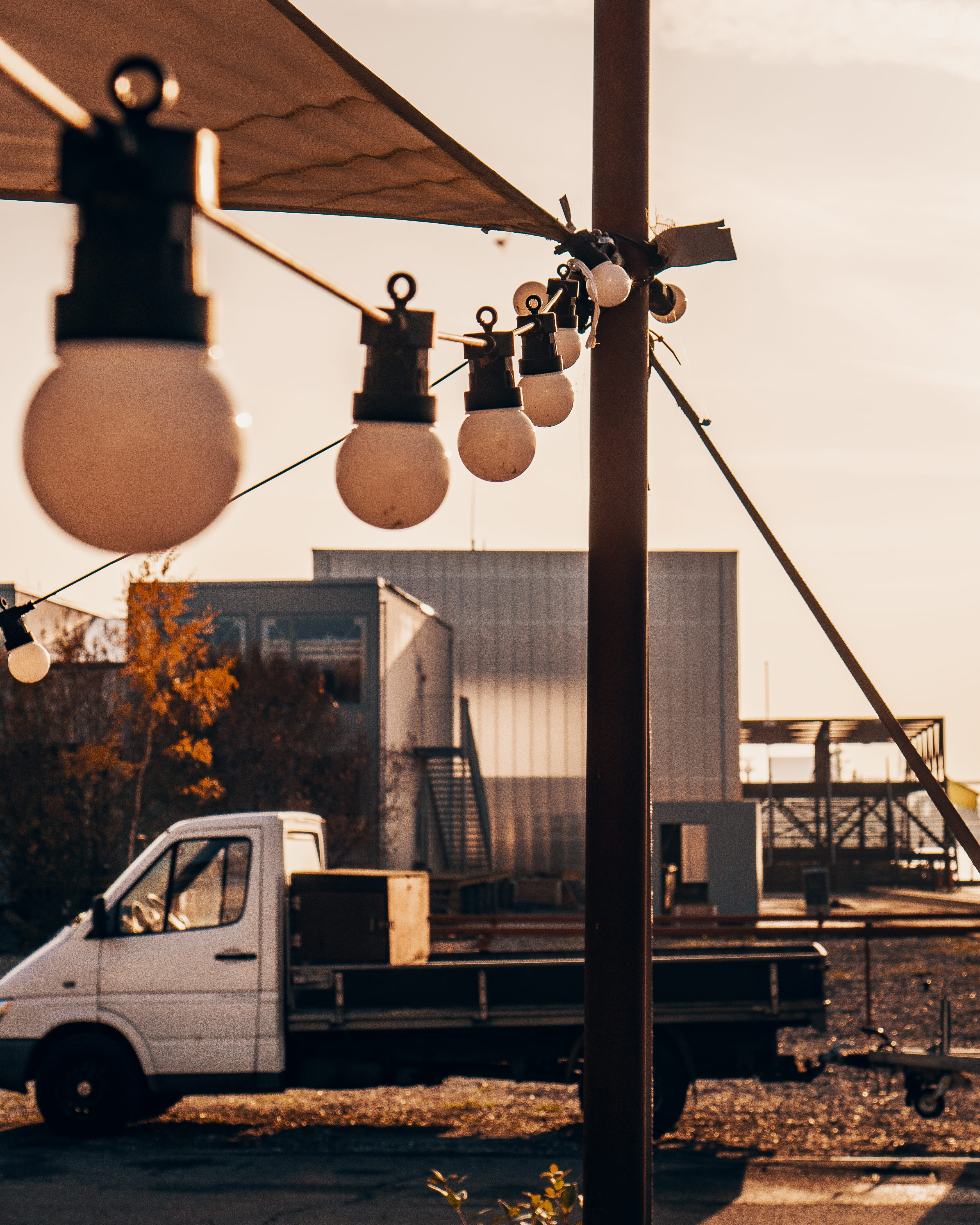 machine, vehicle, town, transportation, building, plant, built structure, utility pole, white, metal, outdoors, building exterior, flare, low angle view, Phone HD Wallpaper