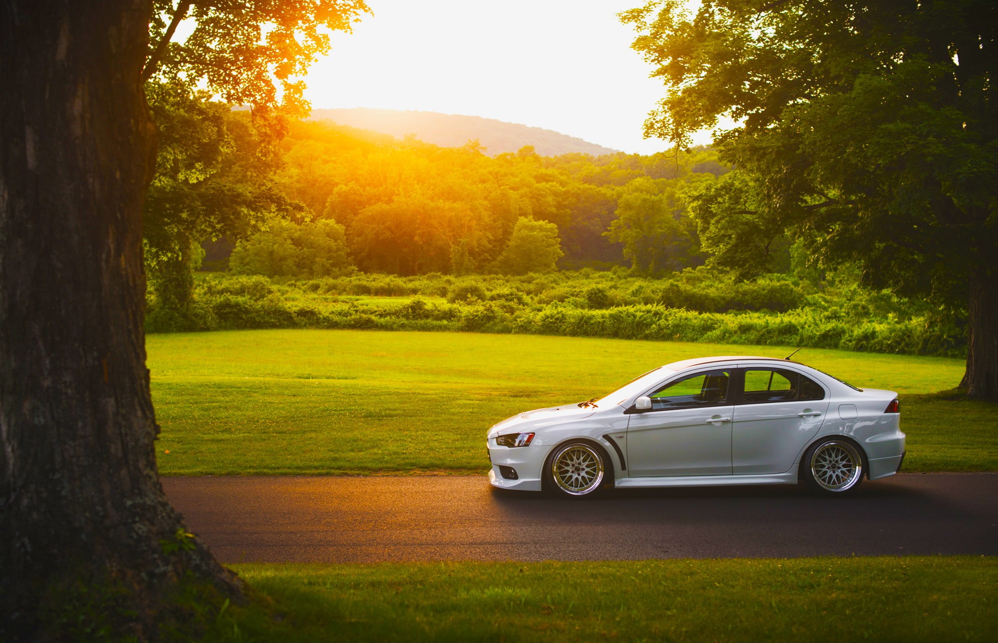 Mitsubishi, evolution, car, Evolution X, white, lancer, sun, grass, x, Sunset, road, stance, Side, sedan, 1080P, HD Wallpaper