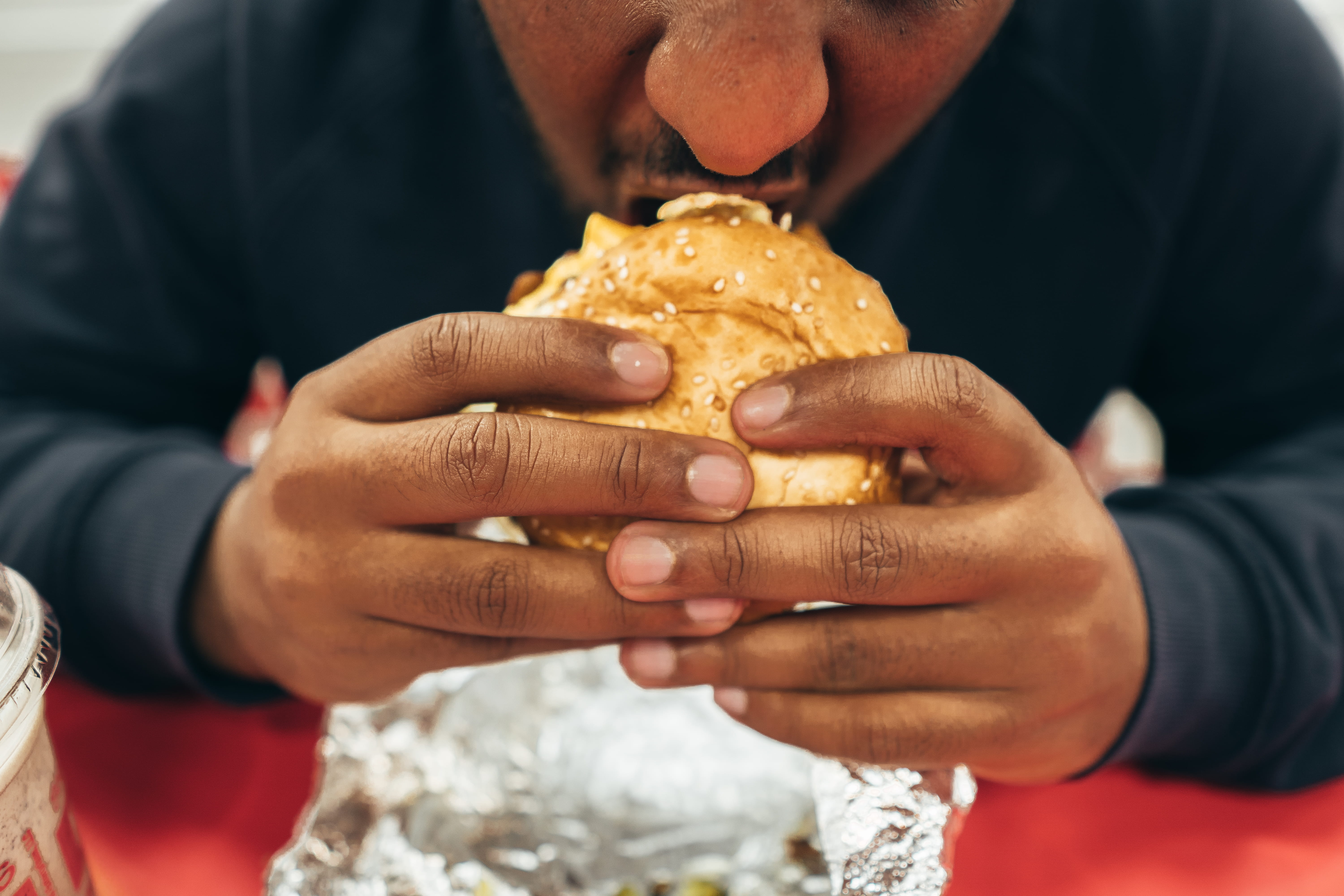 man, burger, human hand, snack, males, one person, temptation, casual clothing, unhealthy eating, indoors, meal, close-up, holding, fast food, hand, food and drink, HD Wallpaper