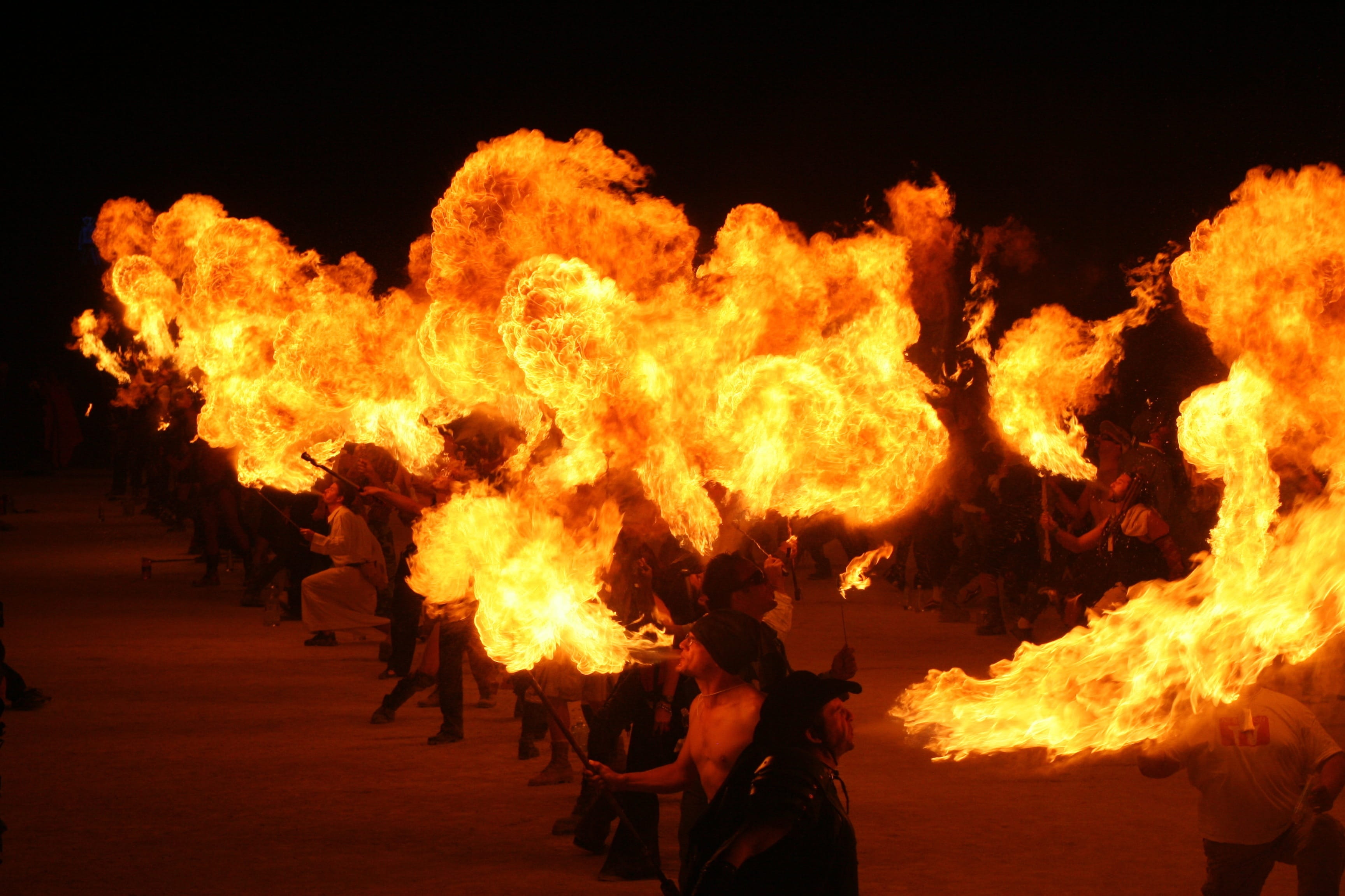 performance, risk, nature, real people, communication, heat - temperature, Burning Man, aggression, exploding, black background, inferno, sign, people, HD Wallpaper