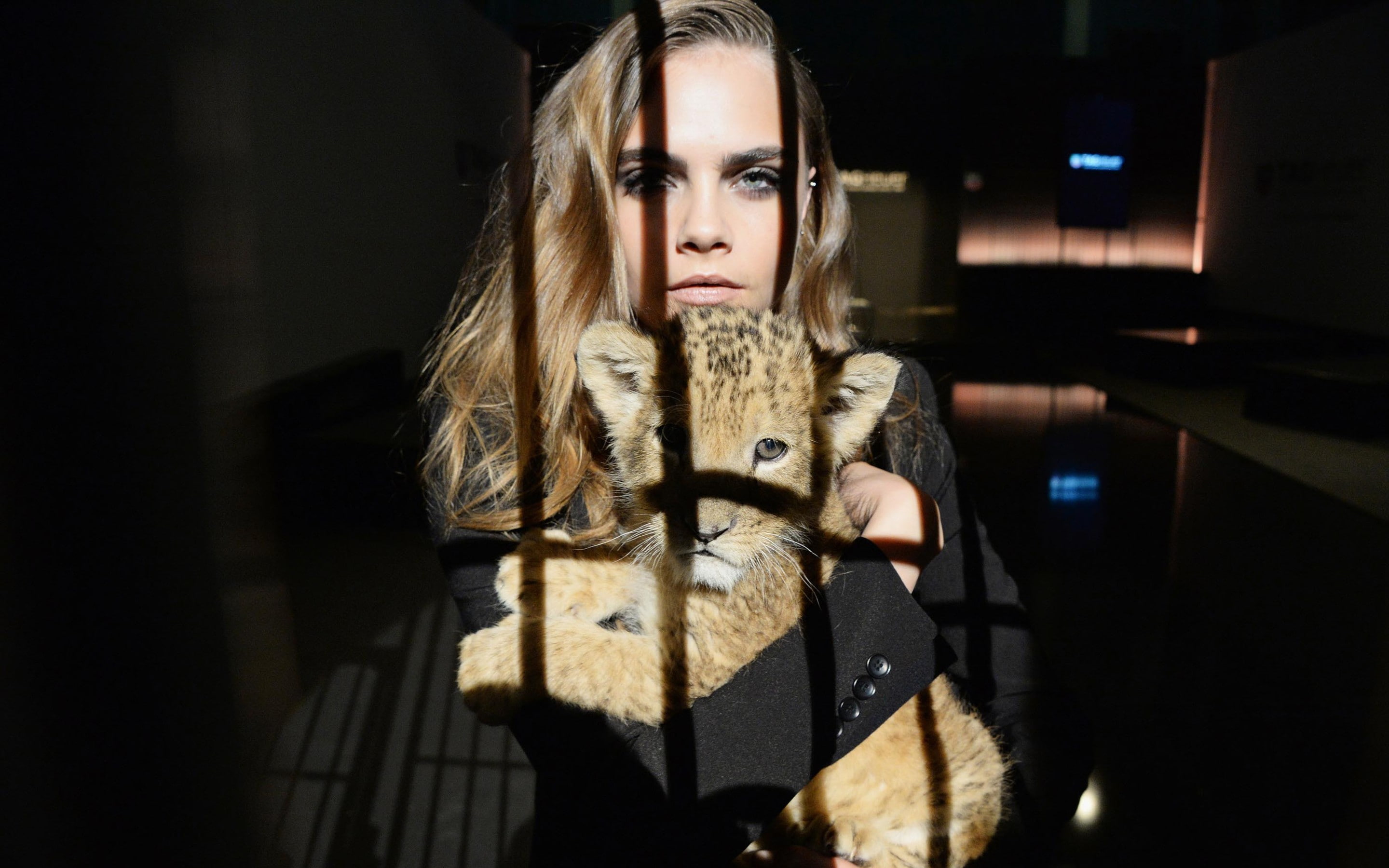clothing, Cara Delevingne, holding, portrait, women, lion, young adult, front view, females, winter, animals, indoors, 2K, warm clothing, one person, fur, HD Wallpaper