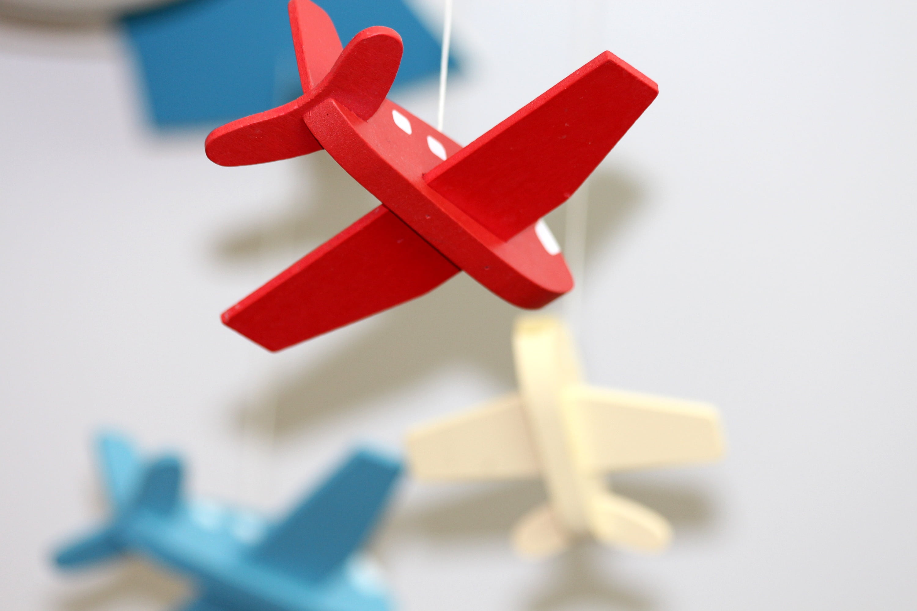 group of objects, symbol, 2K, hanging, business, photography, medium group of objects, red, toy, plastic, plane, focus on foreground, airplane, shallow, HD Wallpaper