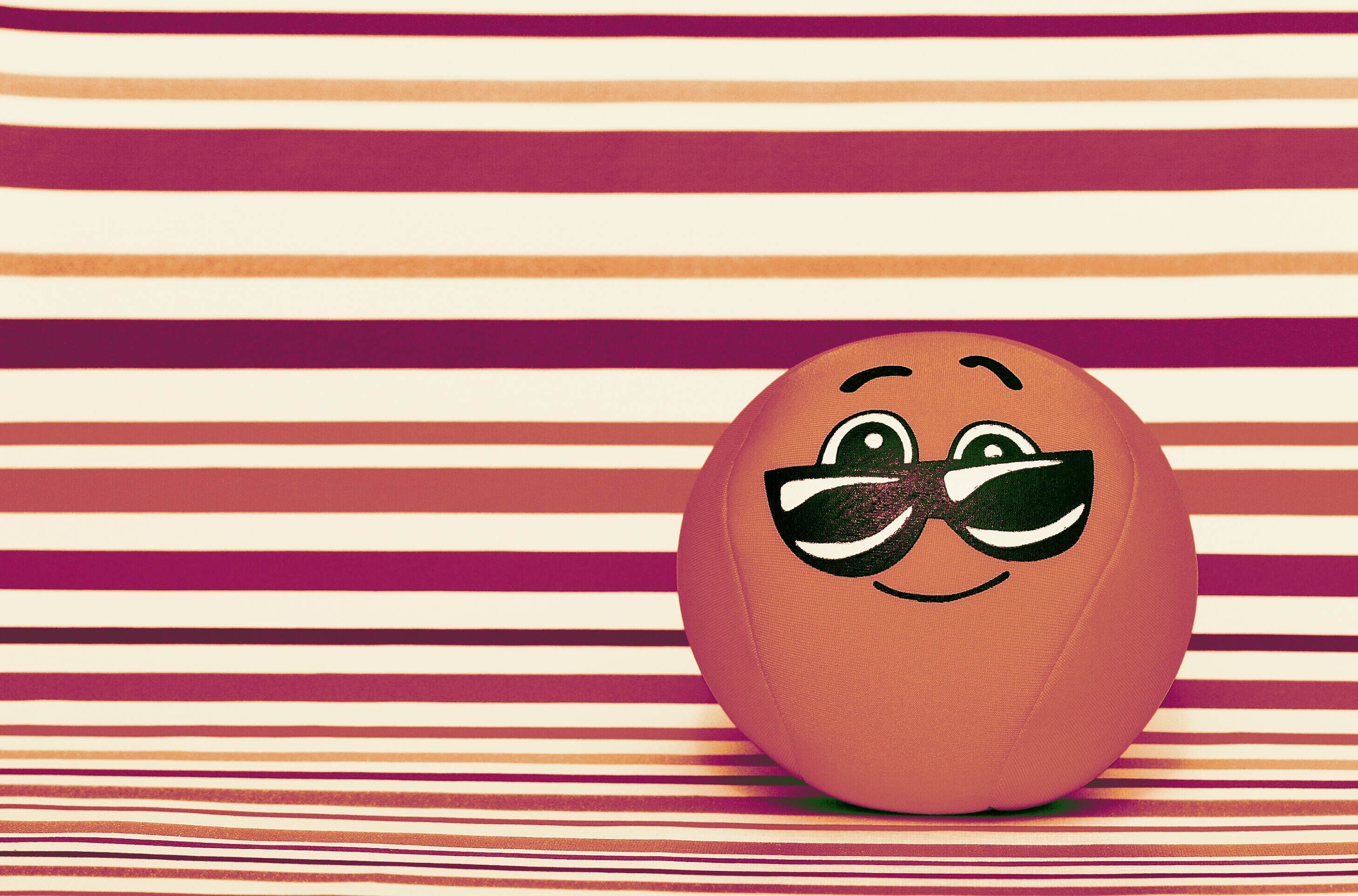 design, close-up, smiley, art and craft, cute, button, cool, circle, pattern, table, no people, ball, still life, funny, single object, 2K, red, representation, HD Wallpaper