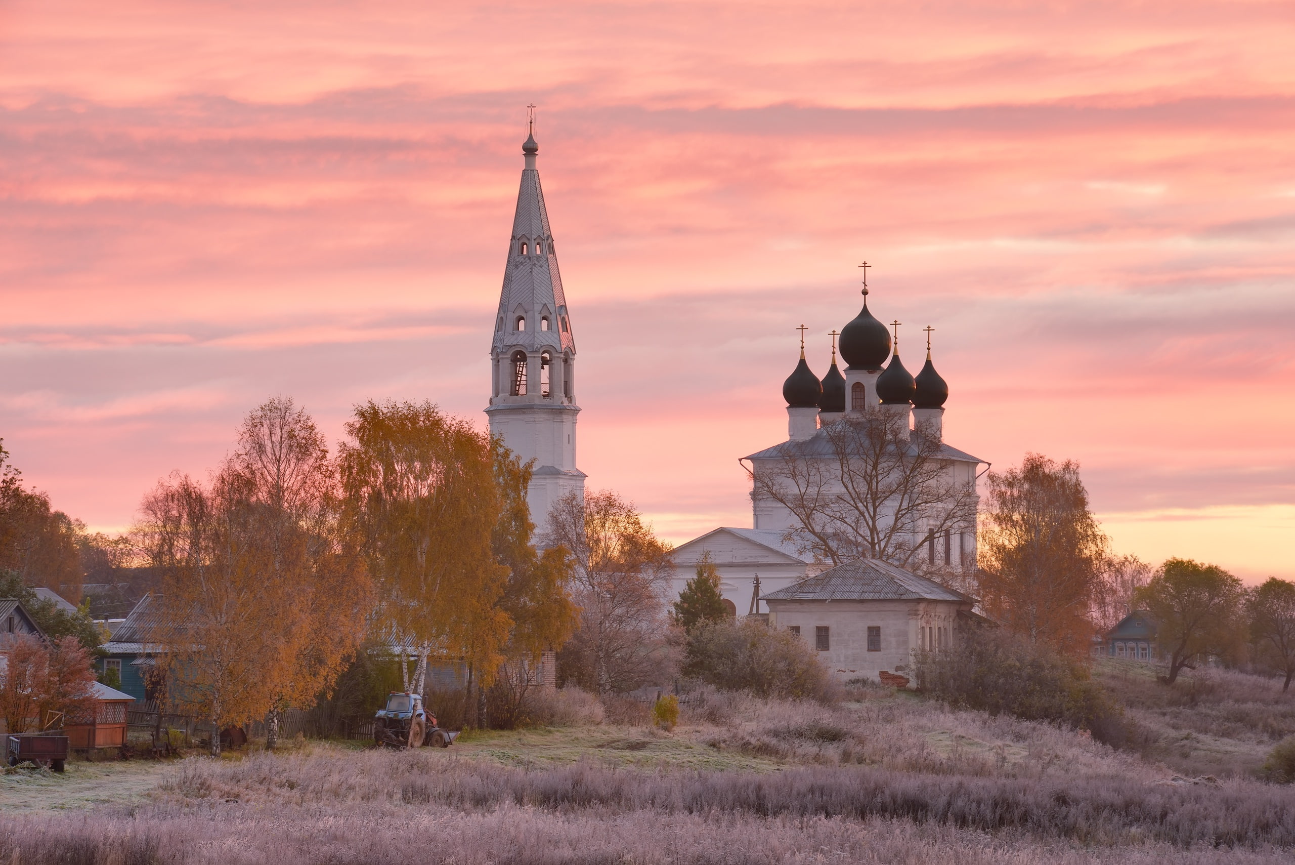 Russian backwoods, 2K, village, clouds, the bell tower, pink, dome, sunset, tractor, dawn, temple, the sky, haze, field, trees, nature, houses, Russia, HD Wallpaper