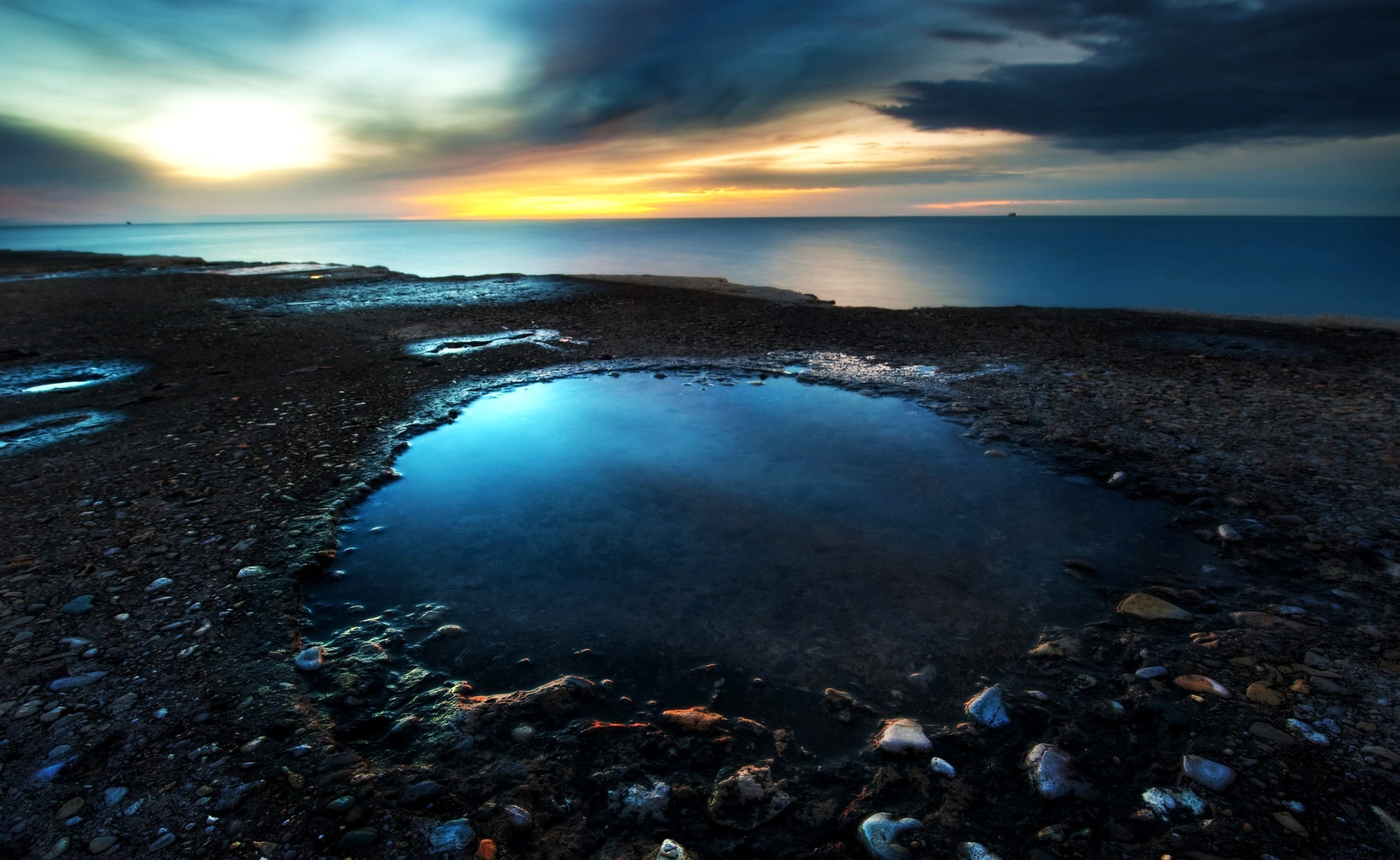 rock, horizon over water, tranquility, water, land, idyllic, horizon, stones, no people, tranquil scene, the sky, beach, sky, beauty in nature, environment, HD Wallpaper