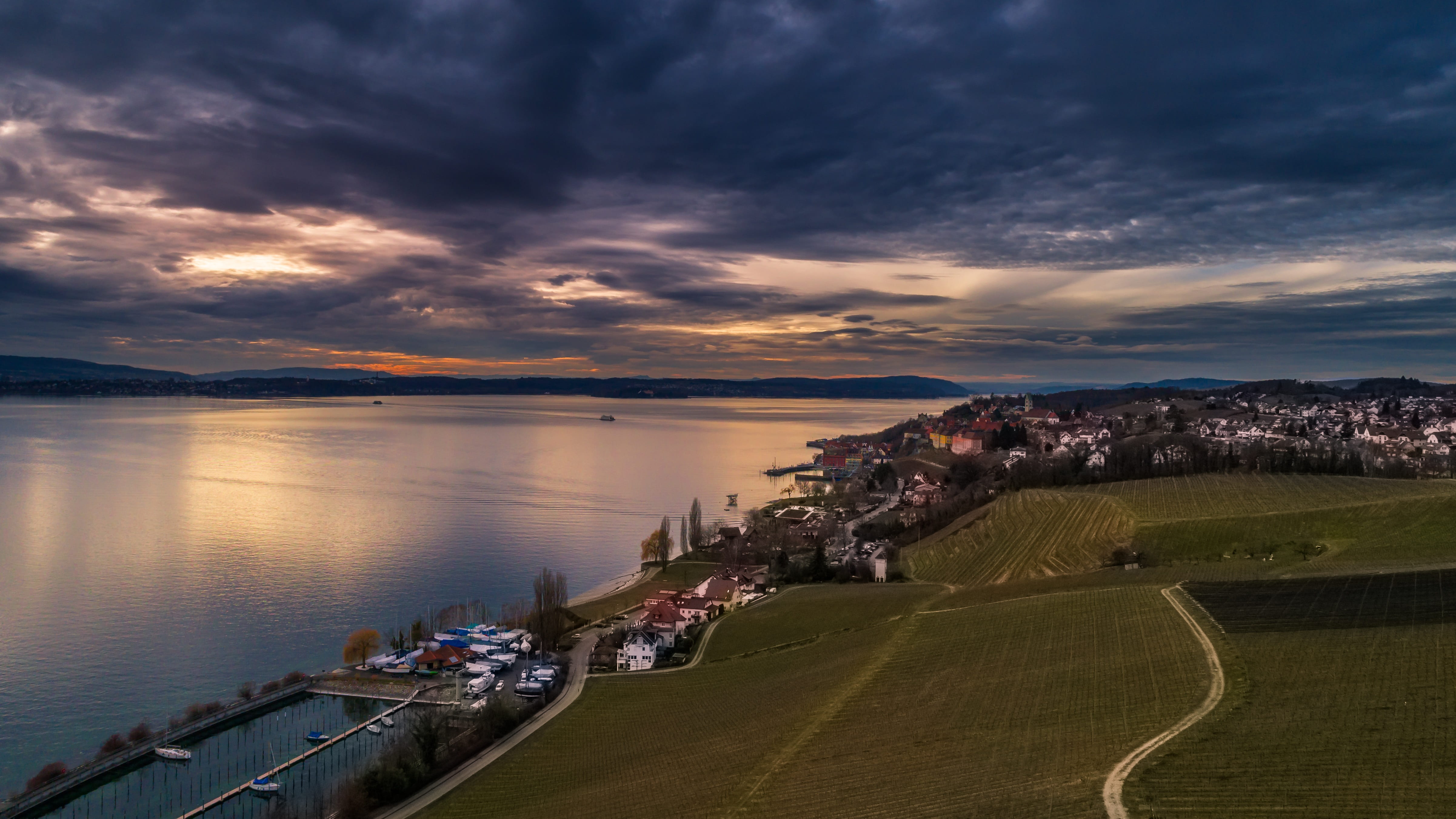 transportation, sunset, sun, clouds form, covered sky, lake constance, city, setting sun, view, building, landscape, nature, sky, buildings, dji, architecture, HD Wallpaper