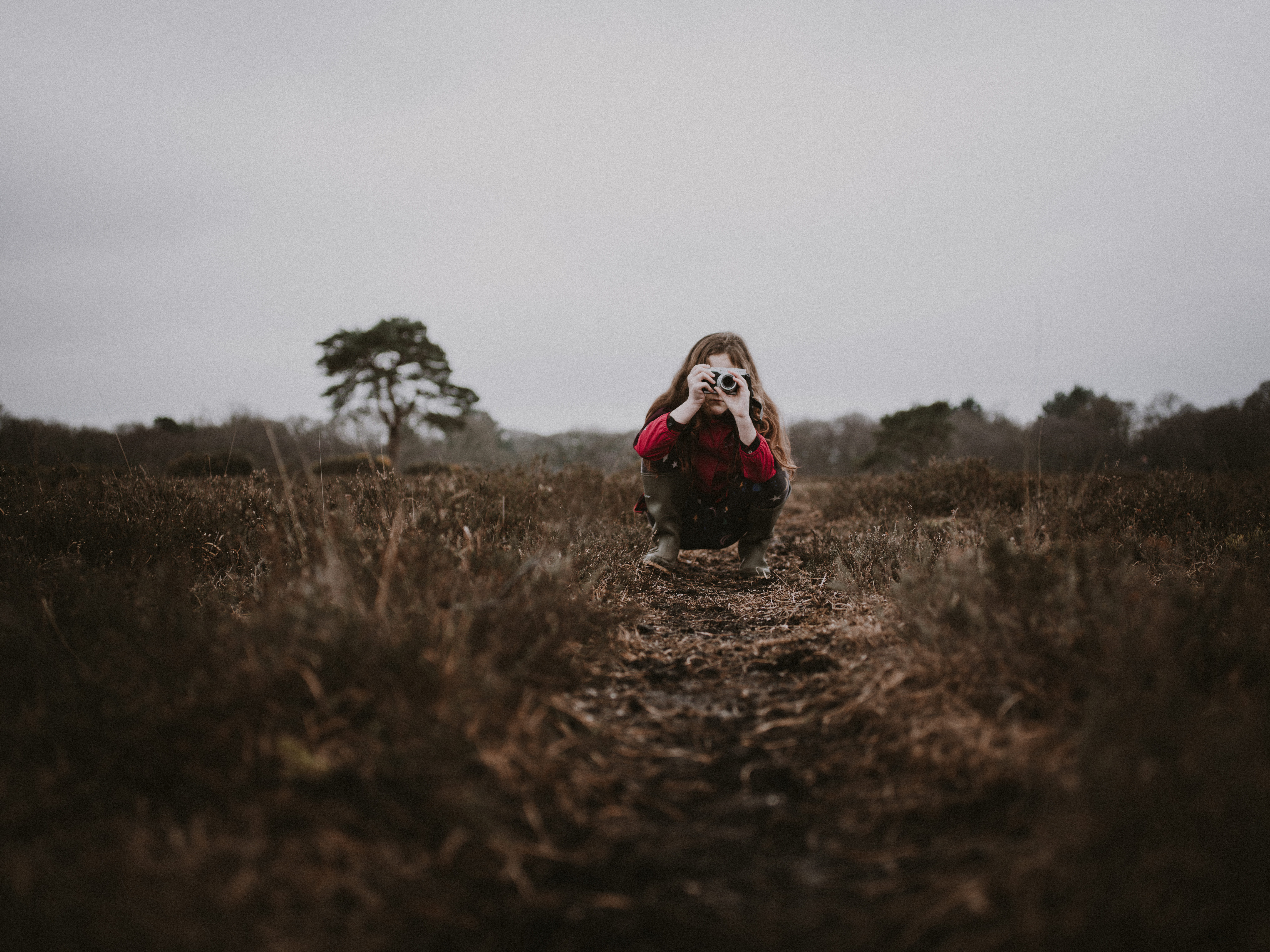photography, selective focus, dog, farm, canine, selective, day, holding, costume, grass, dirt road, front view, mammal, animal, gravel, girl, field, one person, HD Wallpaper