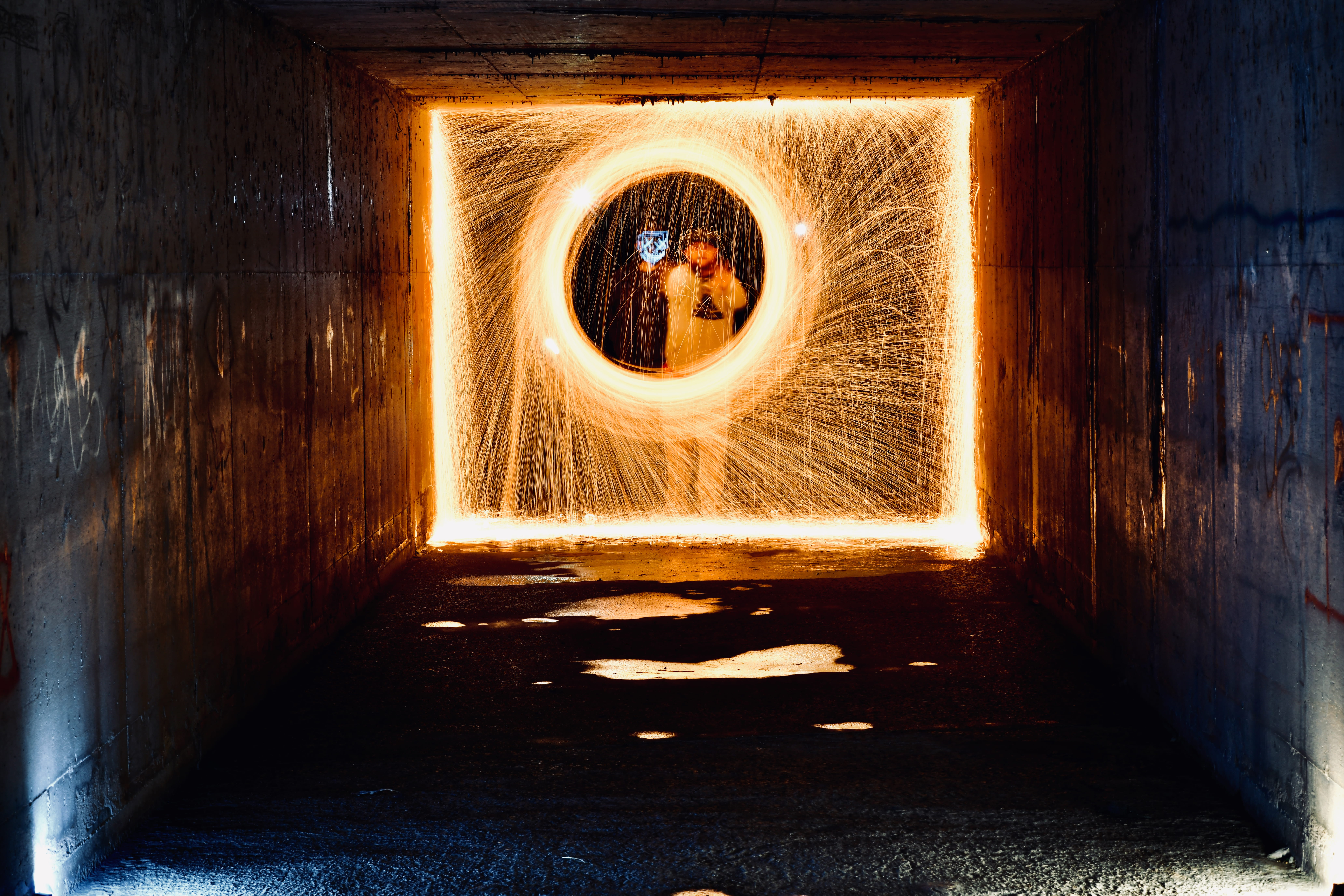 night, person, bunker, sign, wall - building feature, crypt, helmet, motion, drain, building, geometric shape, sparks, architecture, human, illuminated, HD Wallpaper