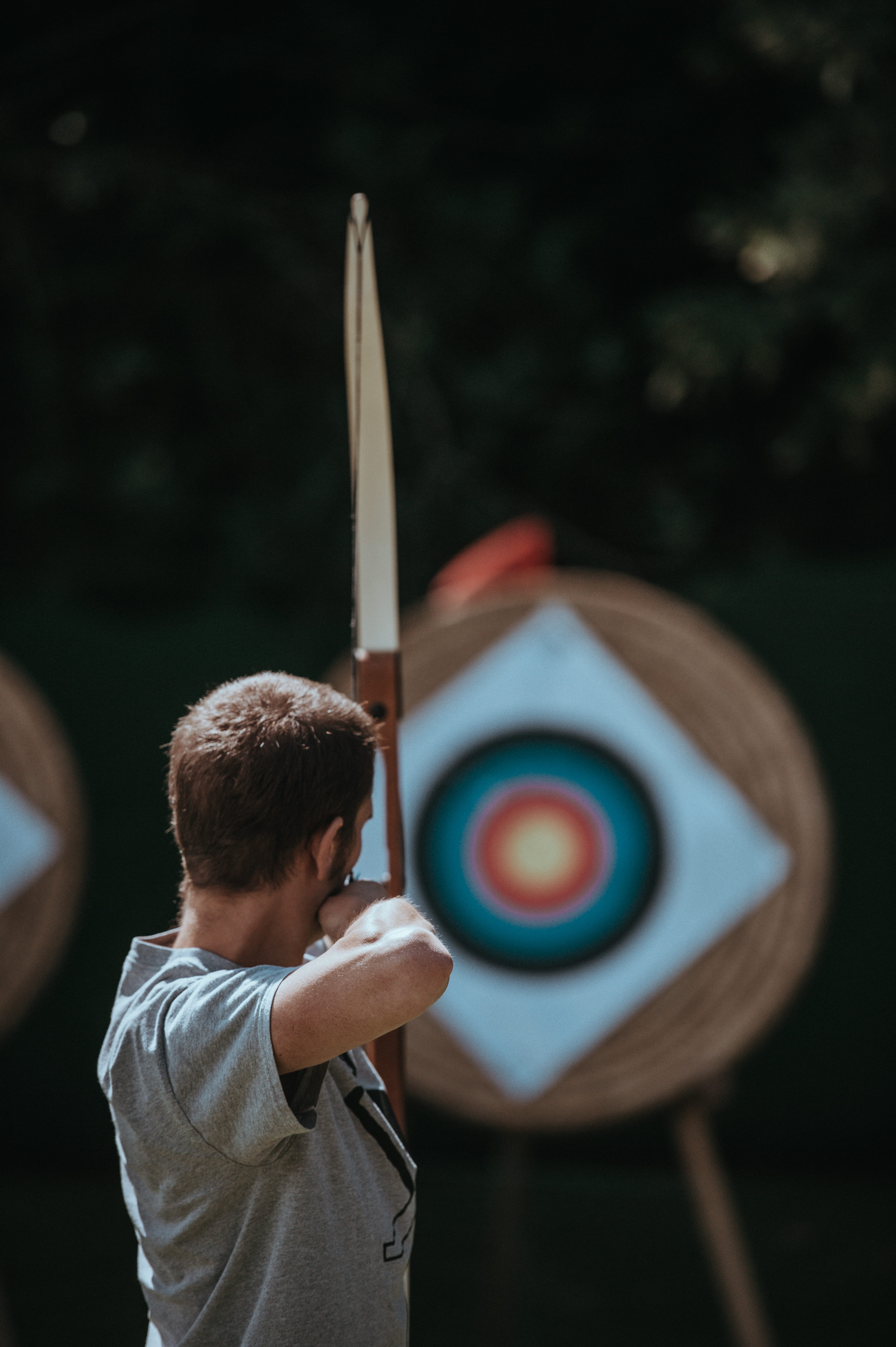 sports target, day, target shooting, male, archery, tree, rear view, lifestyles, childhood, using, boys, arrow - bow and arrow, target, focus on foreground, Phone HD Wallpaper