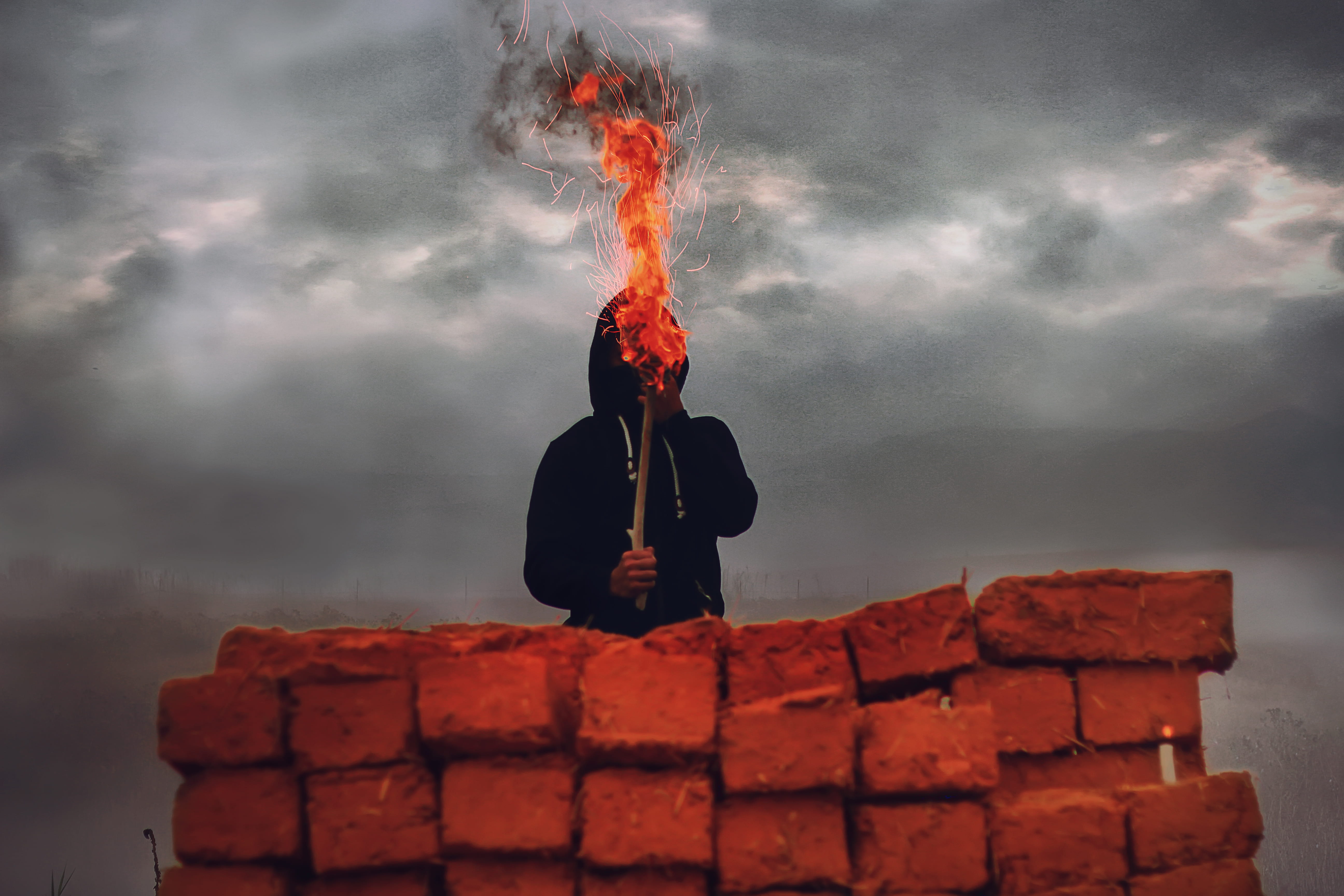 nature, fire breather, concrete, light, person, cloud - sky, holding, architecture, standing, bricks, grey, outdoors, clouds, daytime, color, gray, 5K, HD Wallpaper