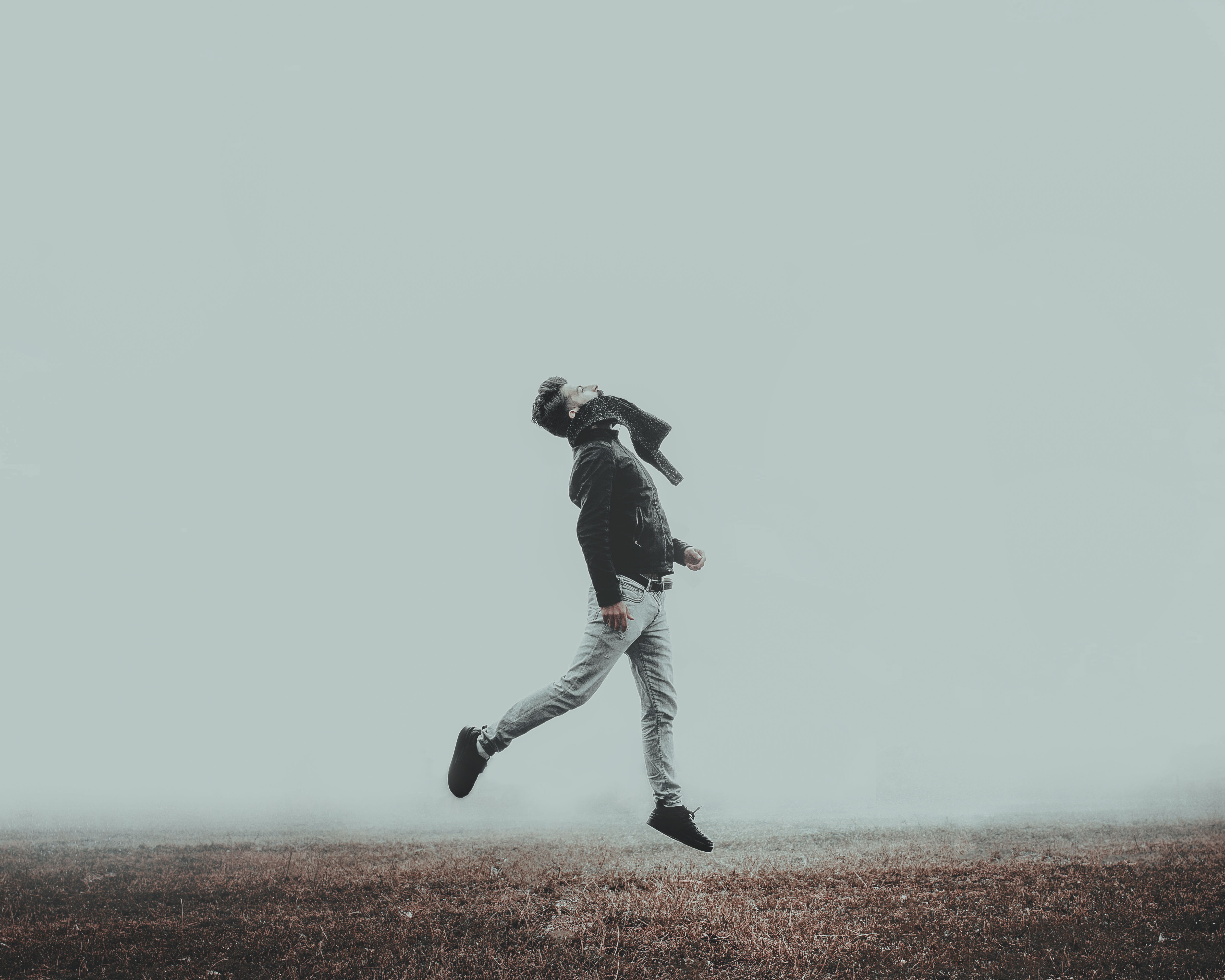 lifestyles, weather, one person, jumping, man, photography, real people, side view, young men, full length, road, men, jump, standing, apparel, human, leisure activity, HD Wallpaper