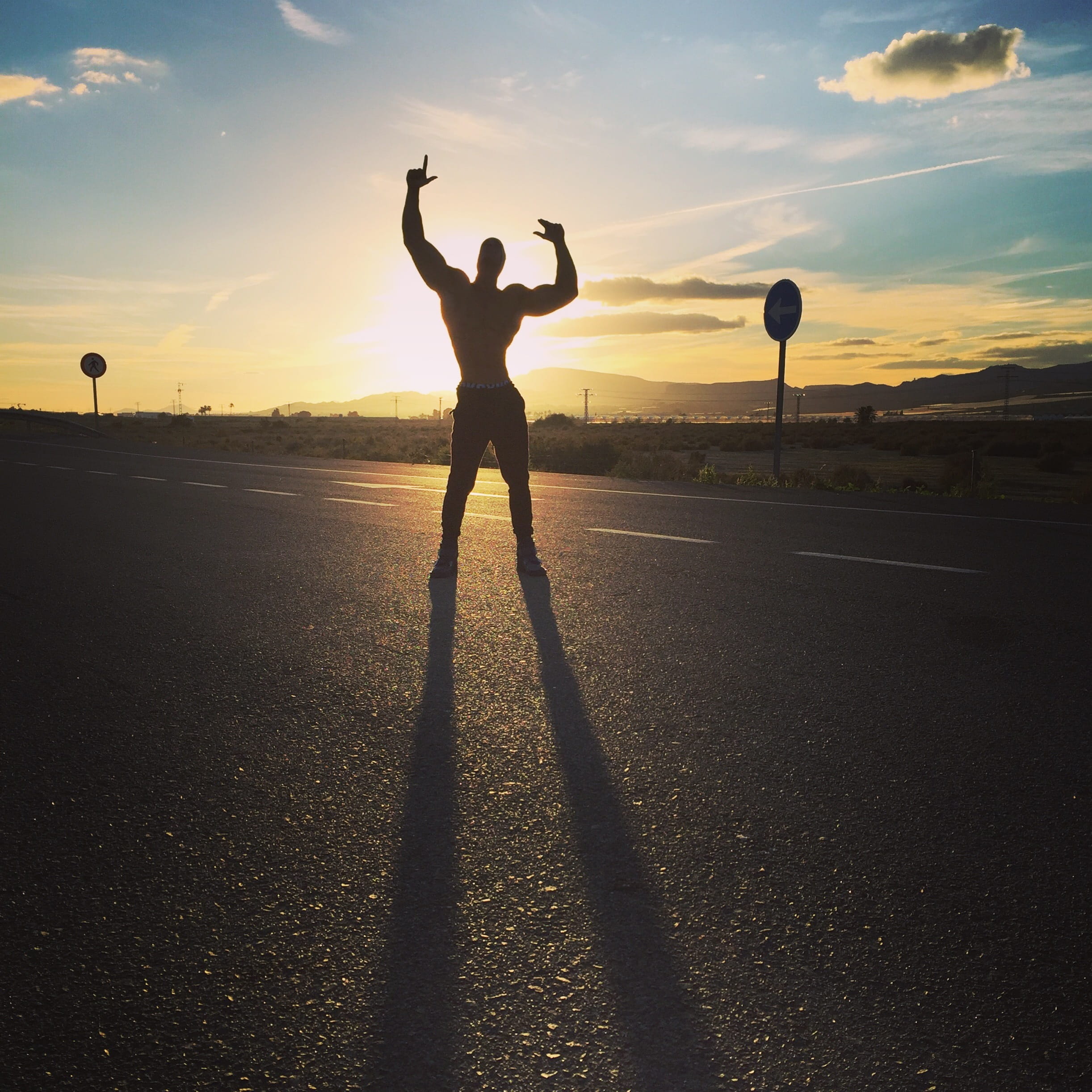 nature, standing, one person, Nutrition, 1080P, men, fit, sunset, road, Aesthetic, real people, Fitness, arms raised, lifestyles, shadow, leisure activity, Phone HD Wallpaper