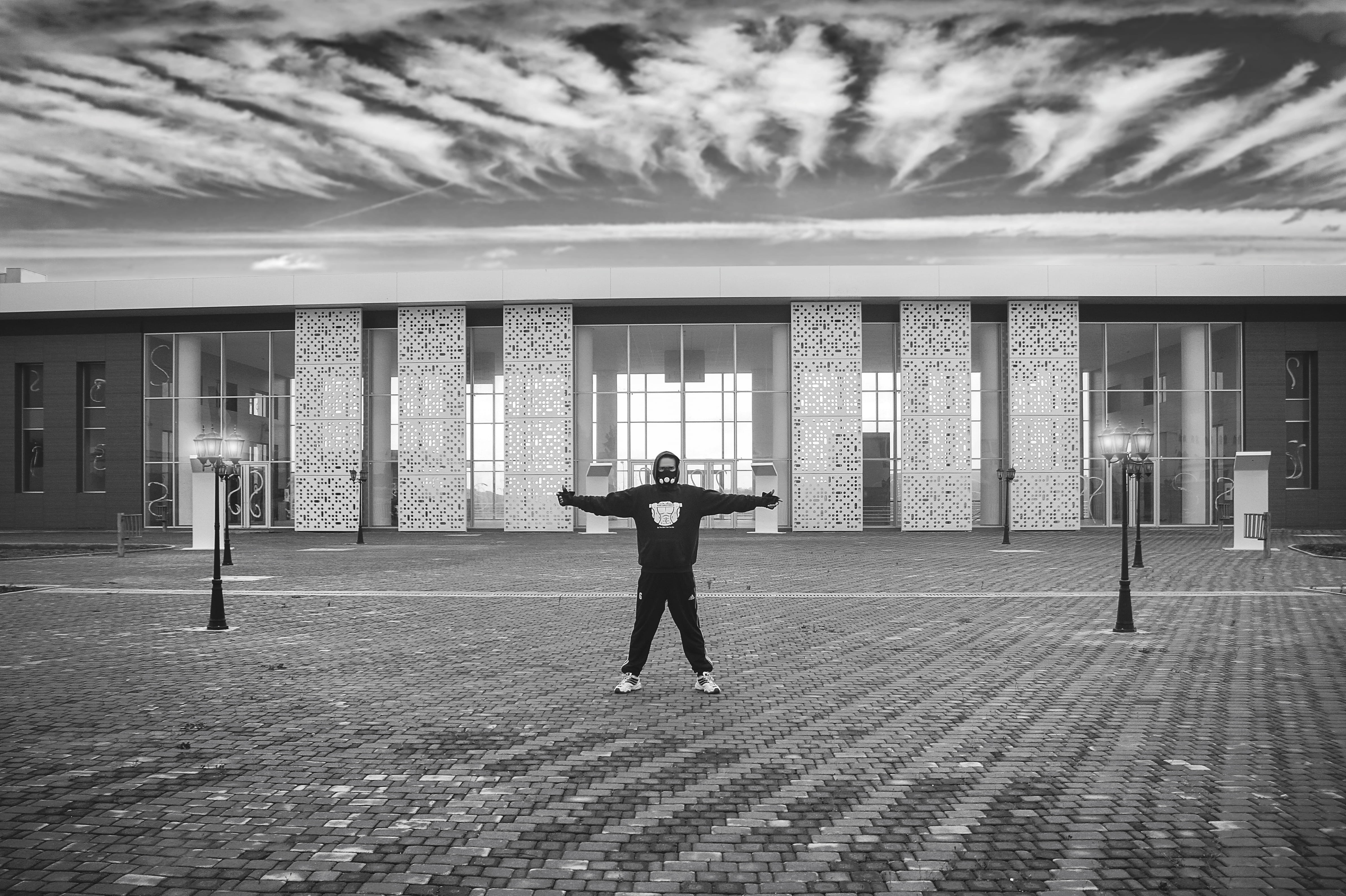cloud - sky, mask, one person, life, built structure, architectural column, 4K, strest, amazing, front view, man, human arm, building, full length, gym, HD Wallpaper