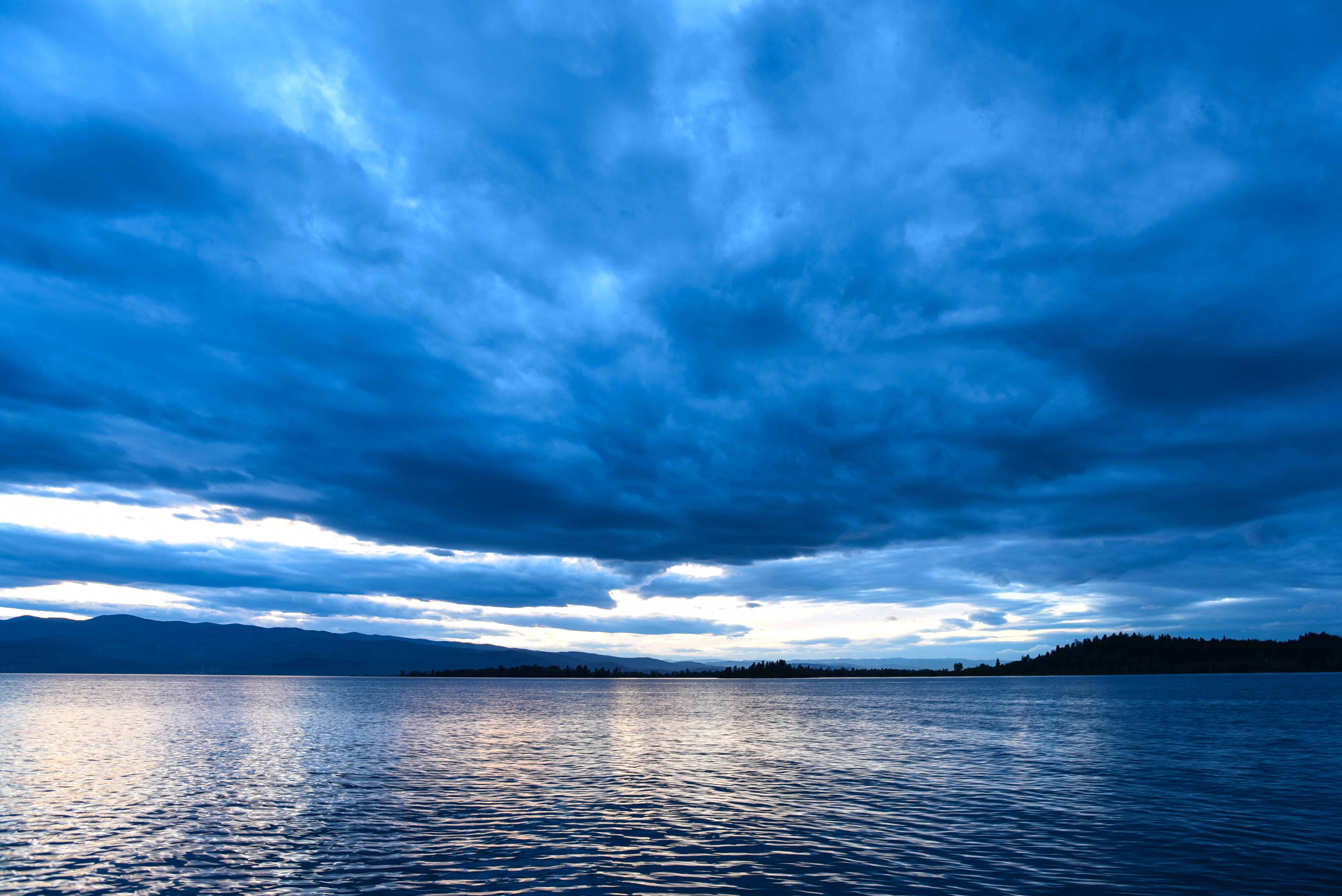 water, sky, montana, lake, nature, dramatic sky, cloud - sky, blue, big sky country, 5K, outdoors, cloudscape, tranquility, tranquil scene, non-urban scene, HD Wallpaper