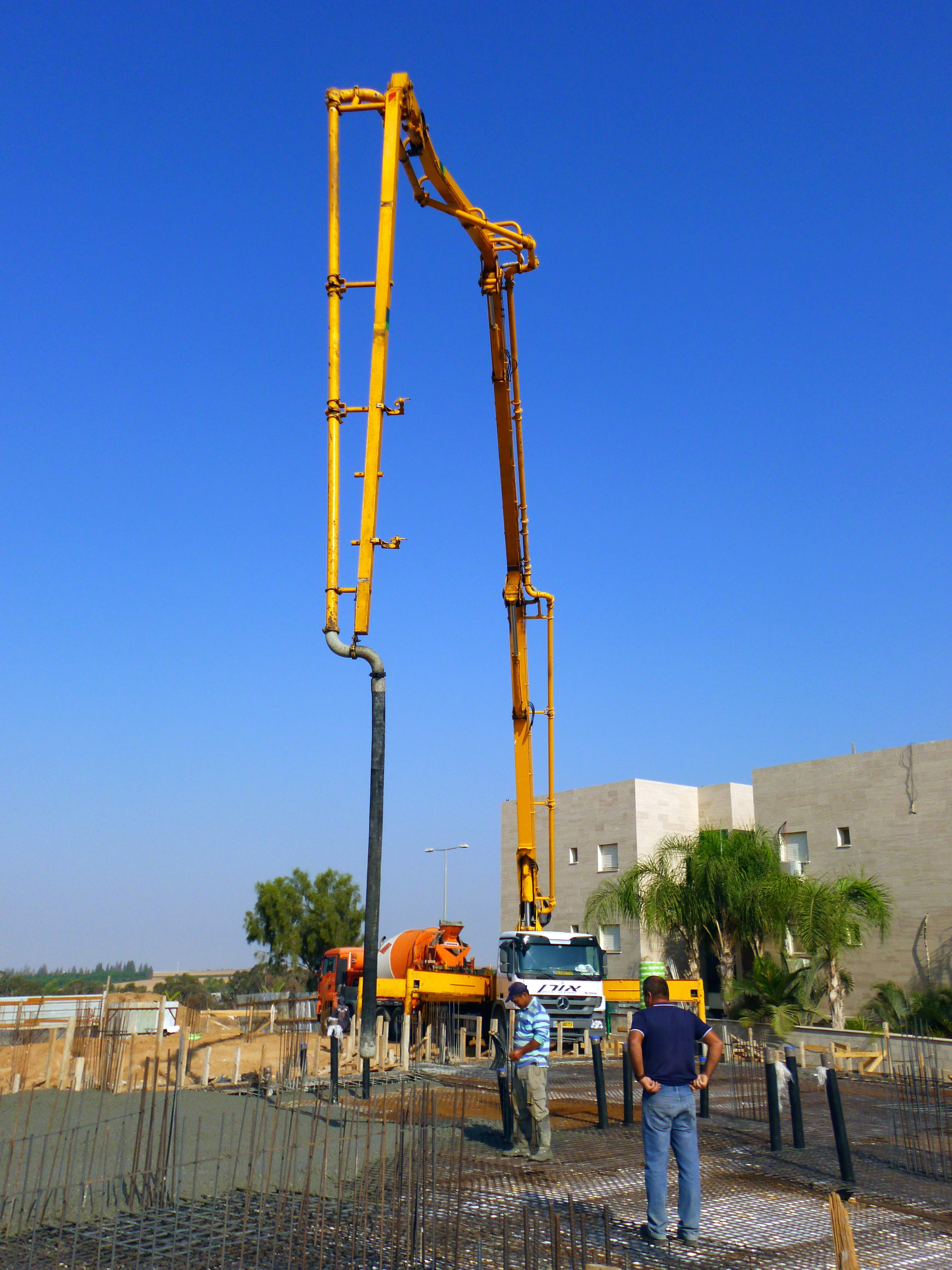 Construction, adult, outdoors, people, crane - construction machinery, day, medium group of people, of technology, copy space, foundation, real people, Phone HD Wallpaper