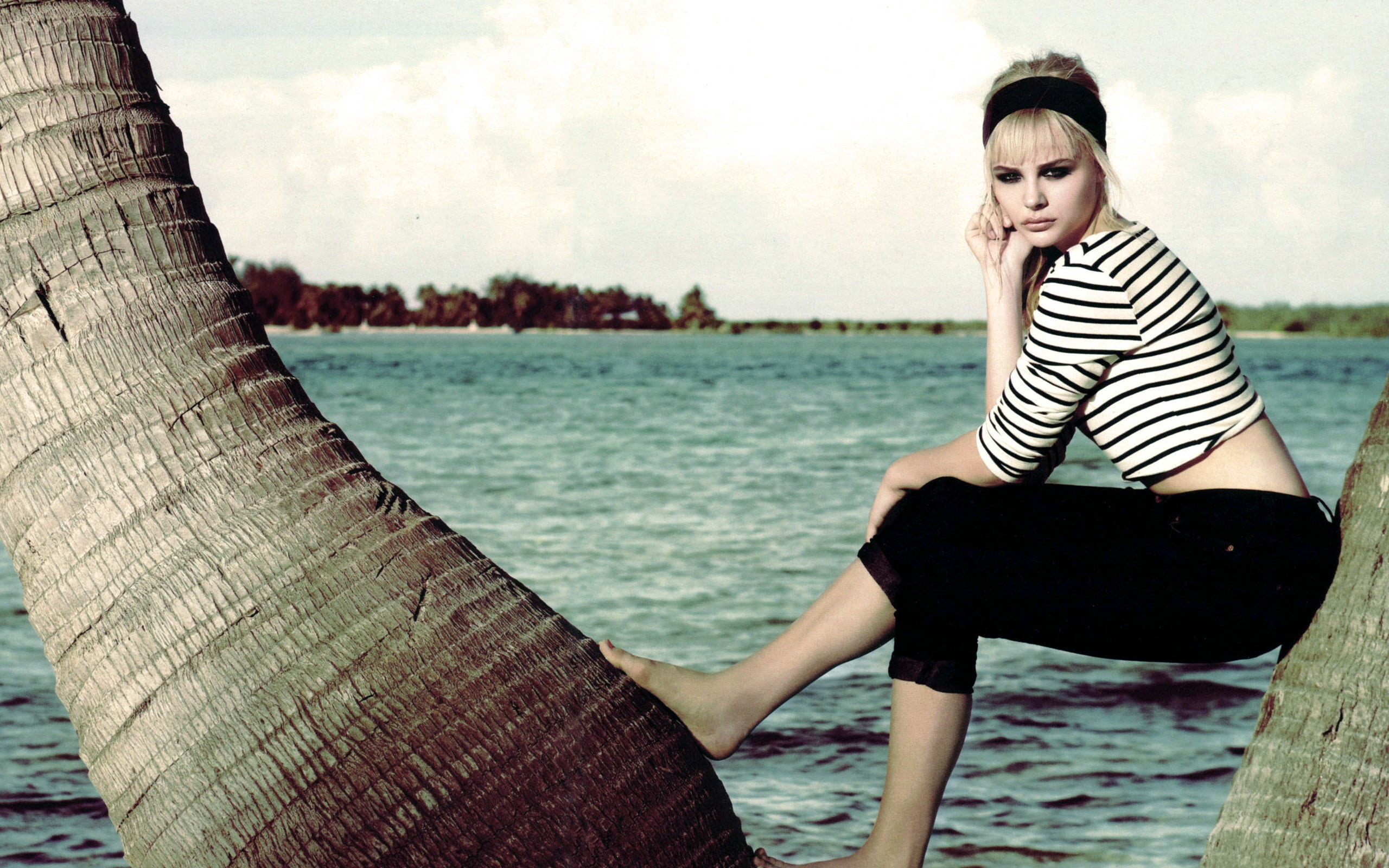 young adult, sitting, Chloë Grace Moretz, 2K, water, contemplation, sea, day, nature, outdoors, three quarter length, leaning, leisure activity, nautical vessel, HD Wallpaper