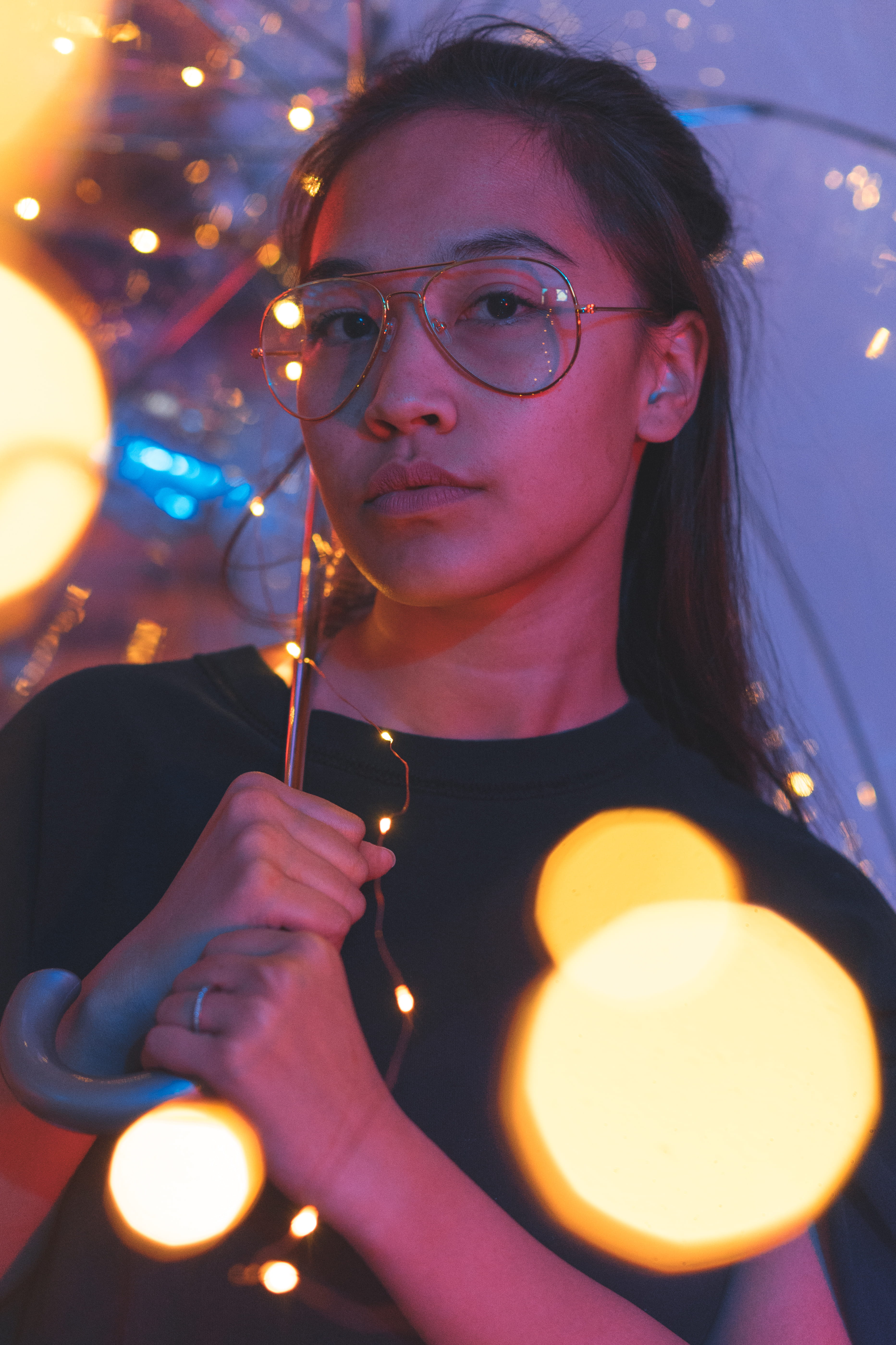 holding, illuminated, pre-adolescent child, glasses, real people, night, united states, headshot, 5K, looking at camera, hairstyle, dark, girl, leisure activity, Phone HD Wallpaper
