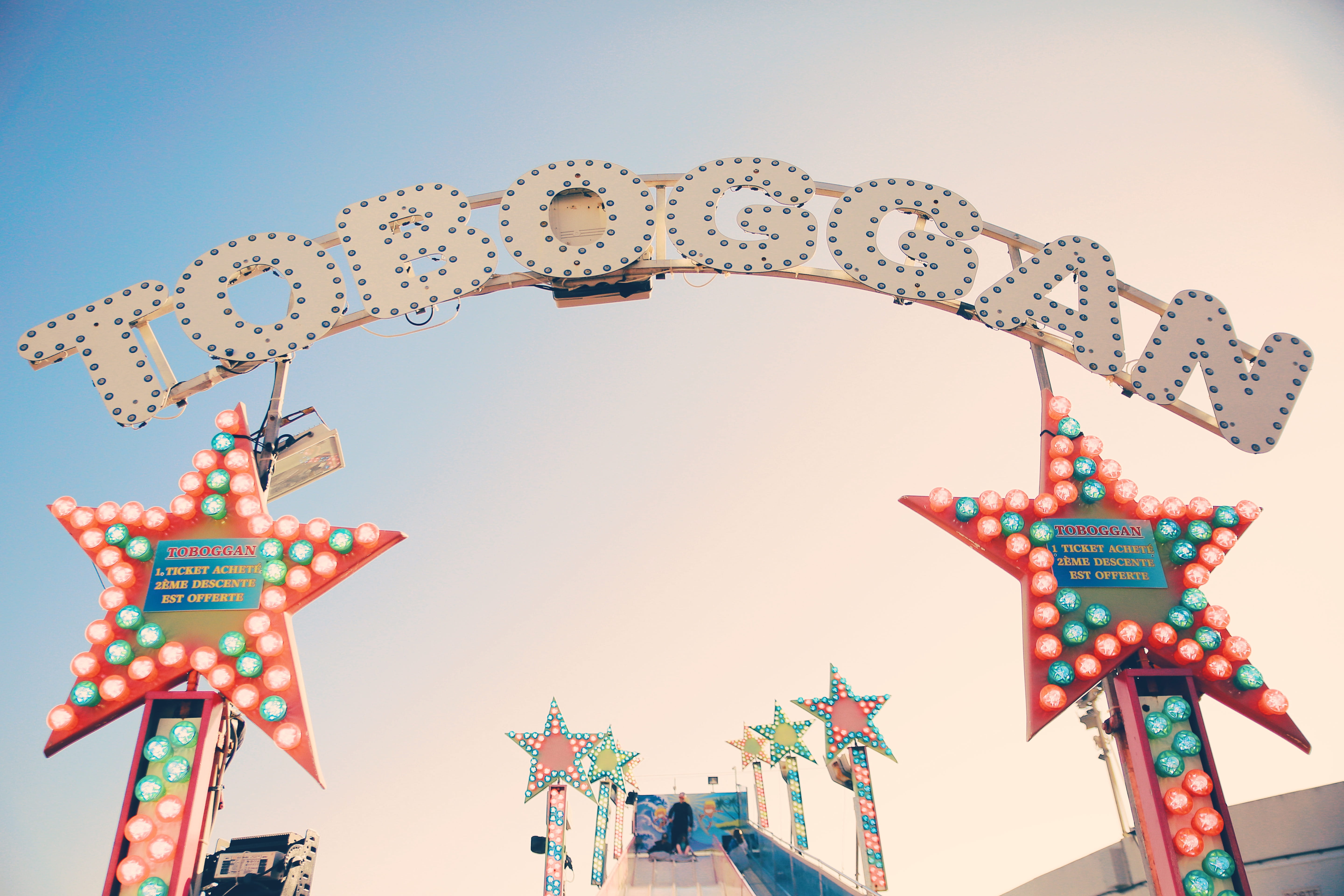 amusement park ride, art and craft, fun, color, holiday, low angle view, blue sky, retro, nature, game, animal representation, amusement park, person, sky, HD Wallpaper