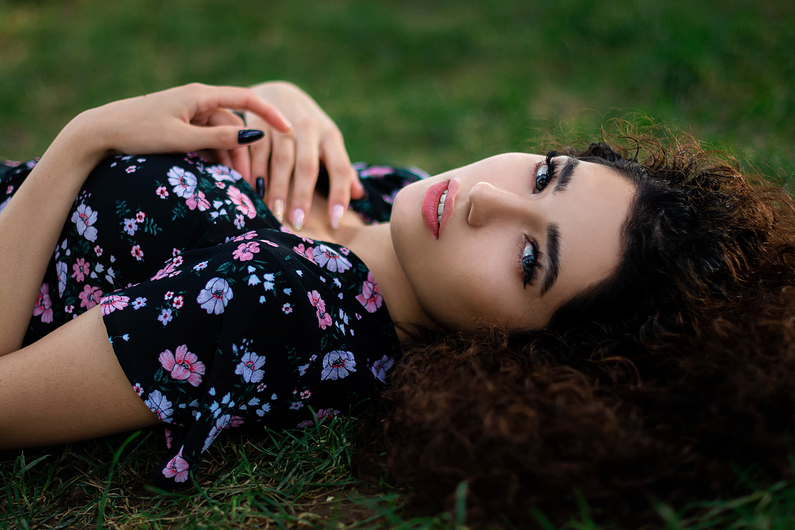 lying on back, grass, face, model, adult, young women, holding, women, leisure activity, portrait, one person, lifestyles, dress, curly hair, hairstyle, HD Wallpaper