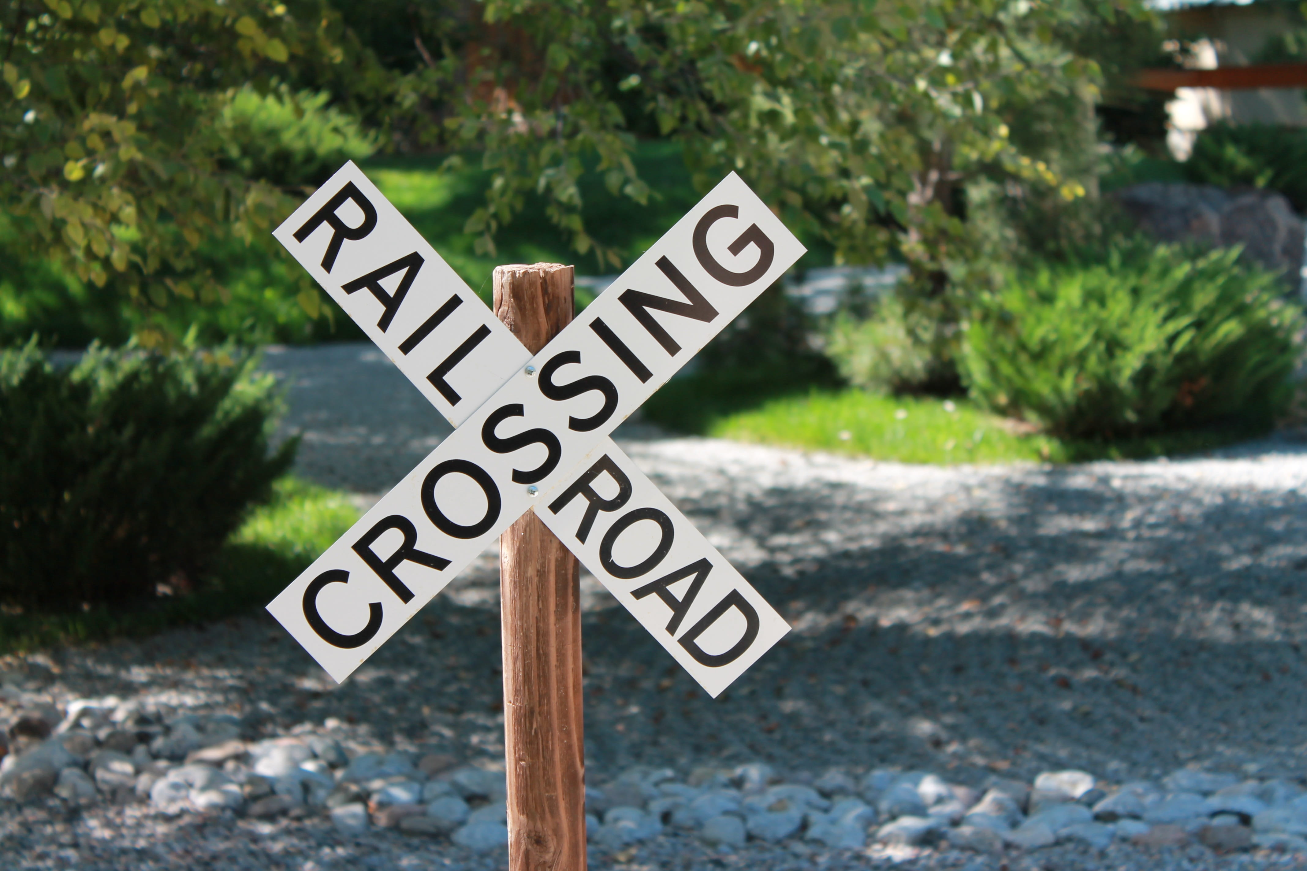 directional sign, safety, text, locomotive, tree, sign, focus on foreground, close, wood - material, western script, street, railroad industry, communication, HD Wallpaper