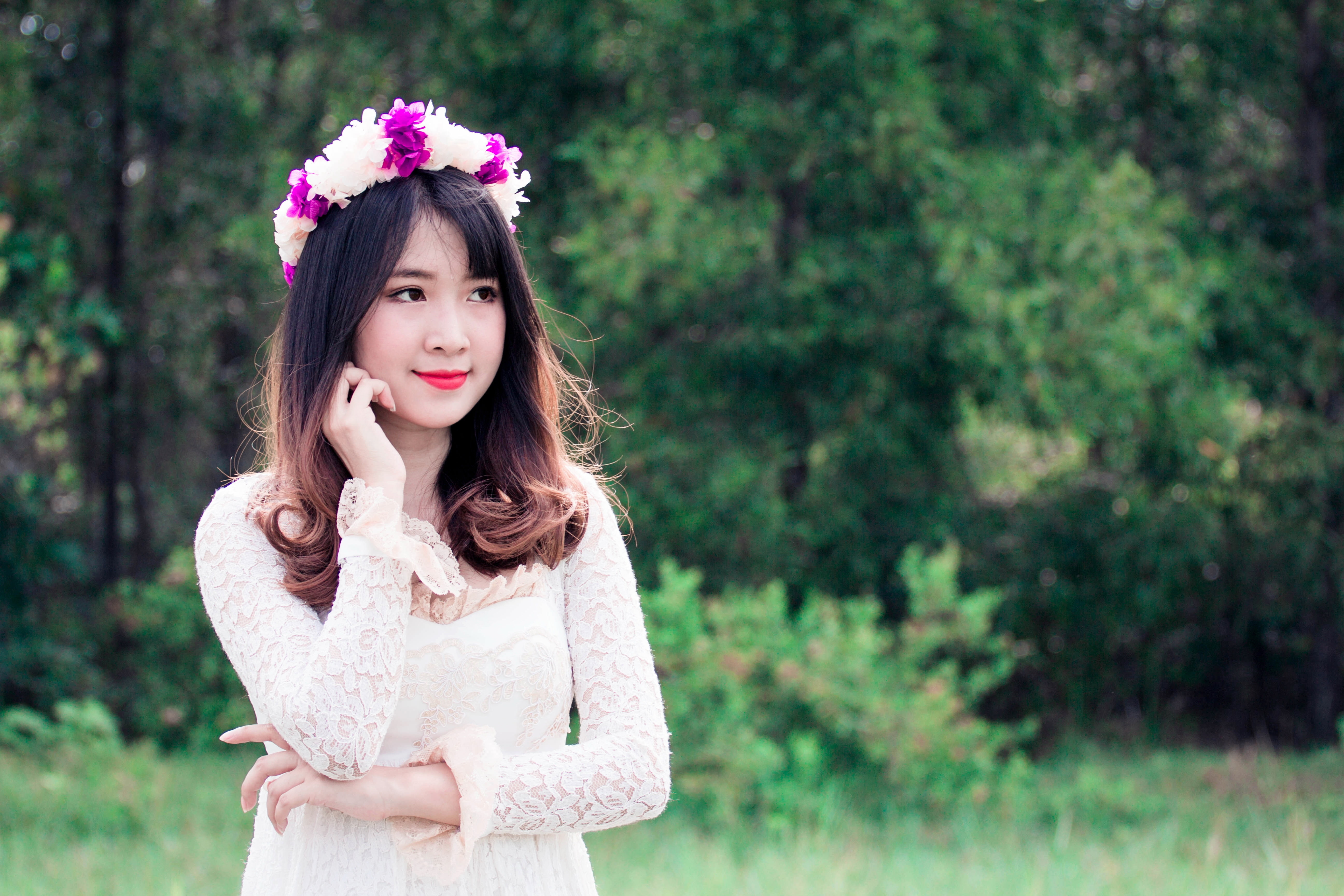 5K, fashion, portrait, clothing, hairstyle, outdoors, flower crown, innocence, tree, offspring, dress, hands on cheek, contemplation, smiling, women, one person, HD Wallpaper
