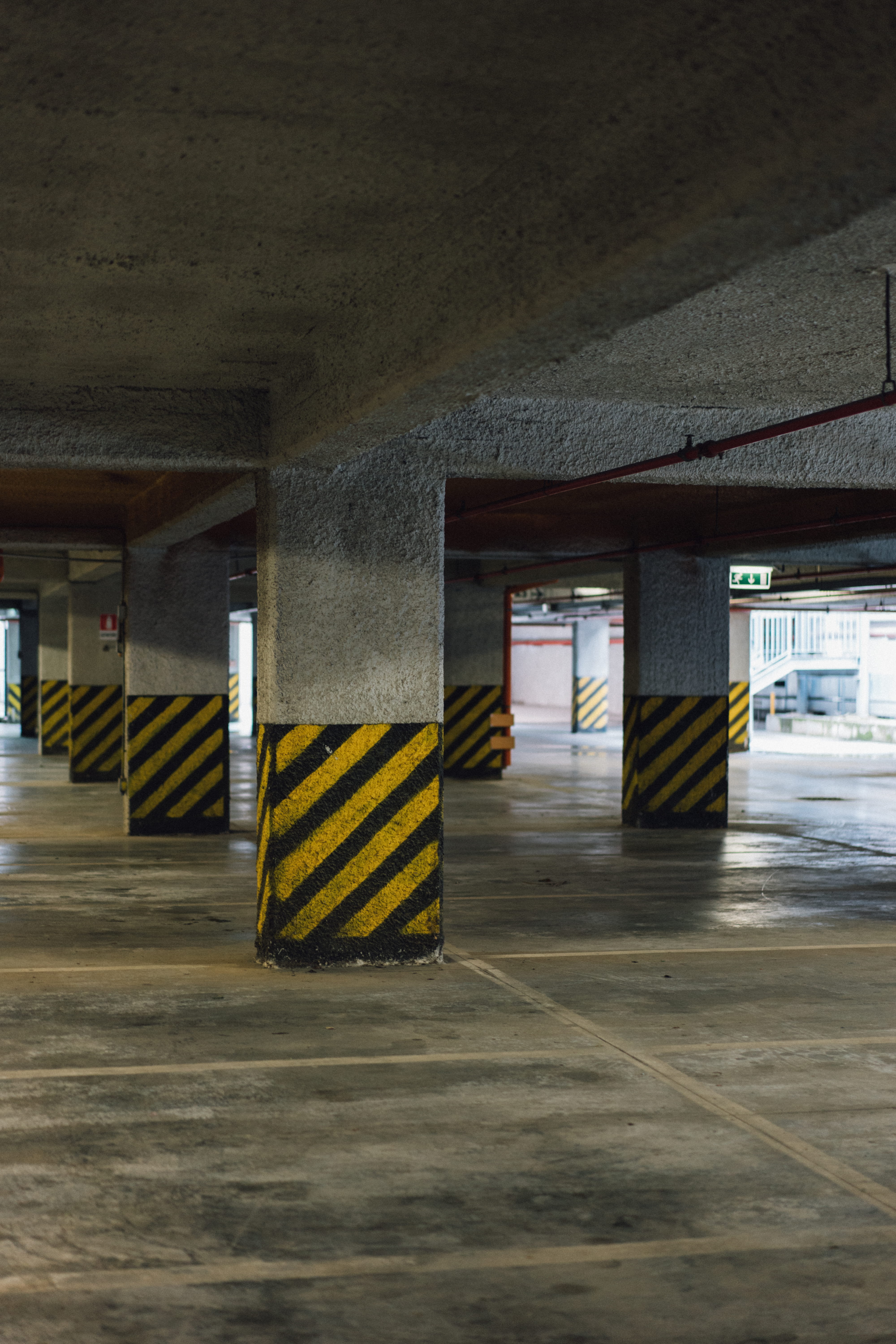 architectural column, ceiling, absence, no people, parking garage, empty, entrance, building, parking, yellow, architecture, flooring, lot, 5K, striped, Phone HD Wallpaper