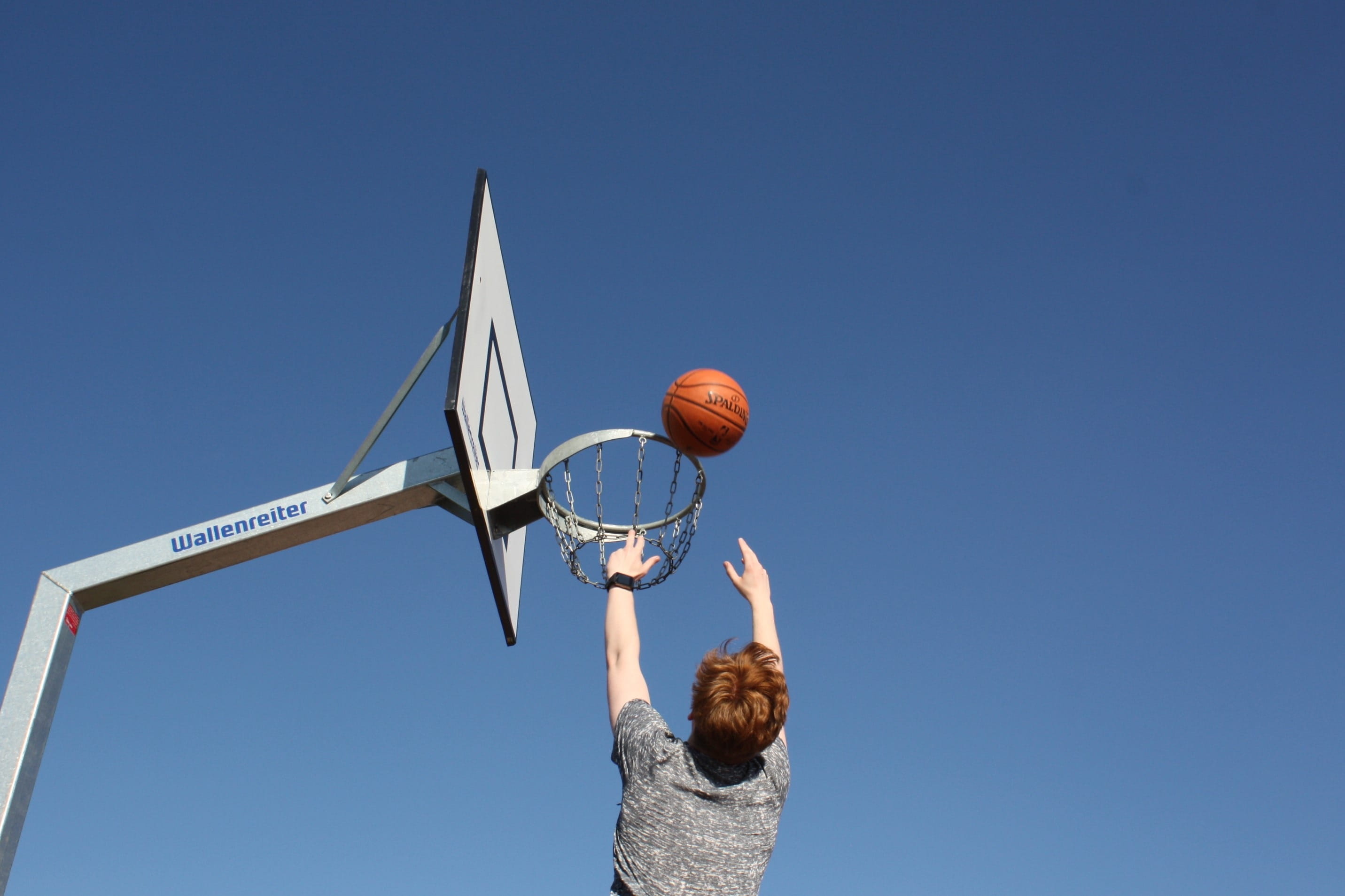 basketball - ball, human arm, achievement, outdoors, Basketball Hoop, ball game, one person, basketball - sport, ball sports, leisure activity, sky, day, HD Wallpaper