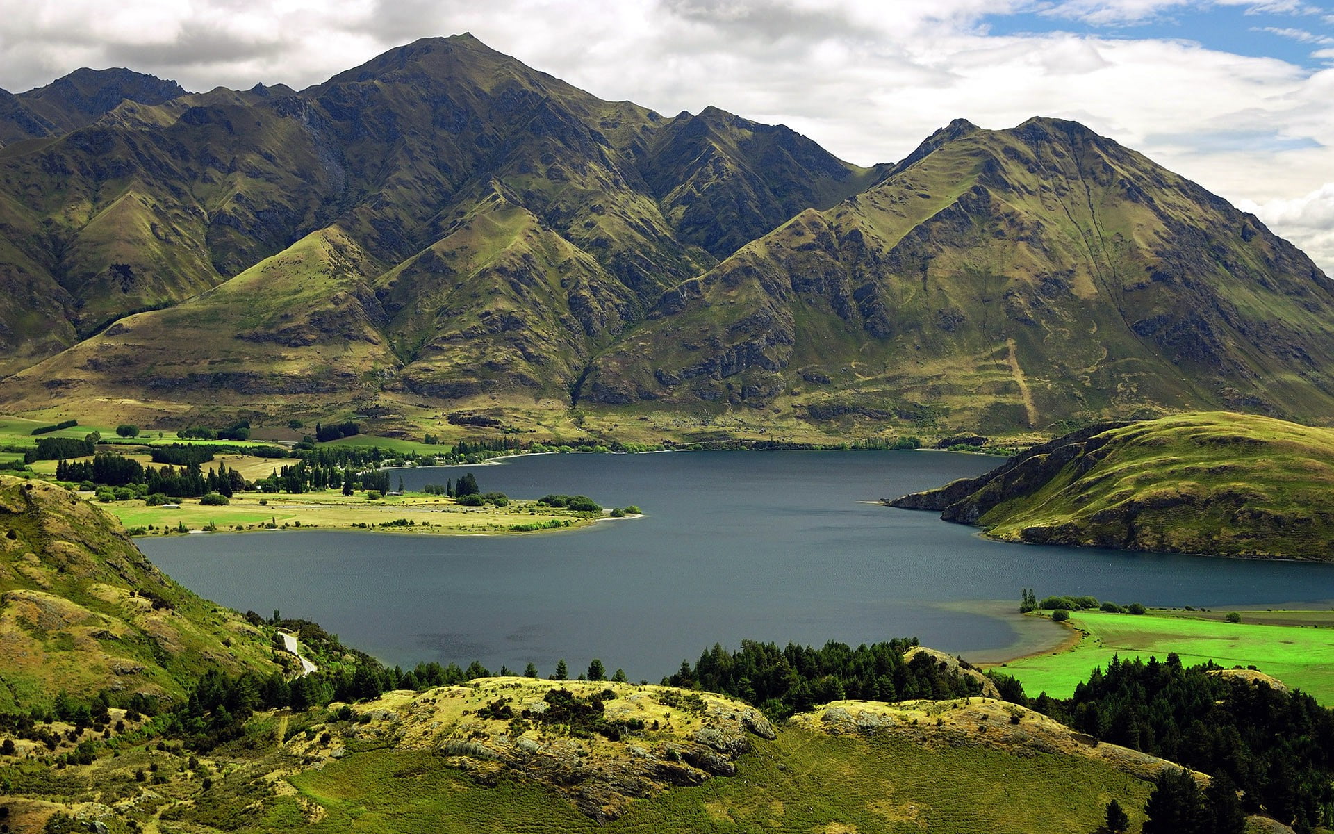 outdoors, tranquil scene, remote, no people, New Zealand, non-urban scene, sky, environment, water, green color, Lake Wanaka, formation, scenics - nature, HD Wallpaper