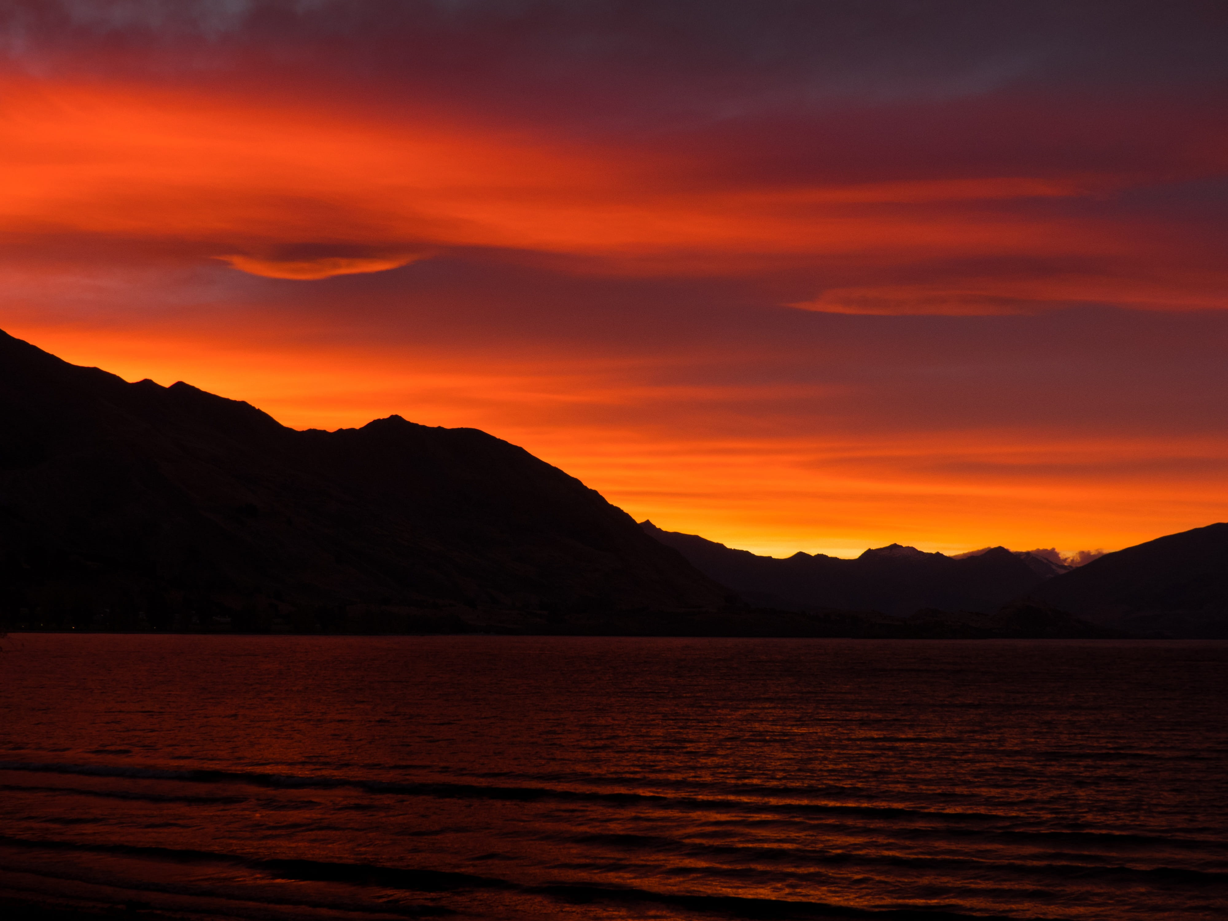tranquil scene, sunset, mountain, new zealand, environment, tranquility, glow, lake, water, beauty in nature, dramatic sky, orange, orange color, silhouette, HD Wallpaper