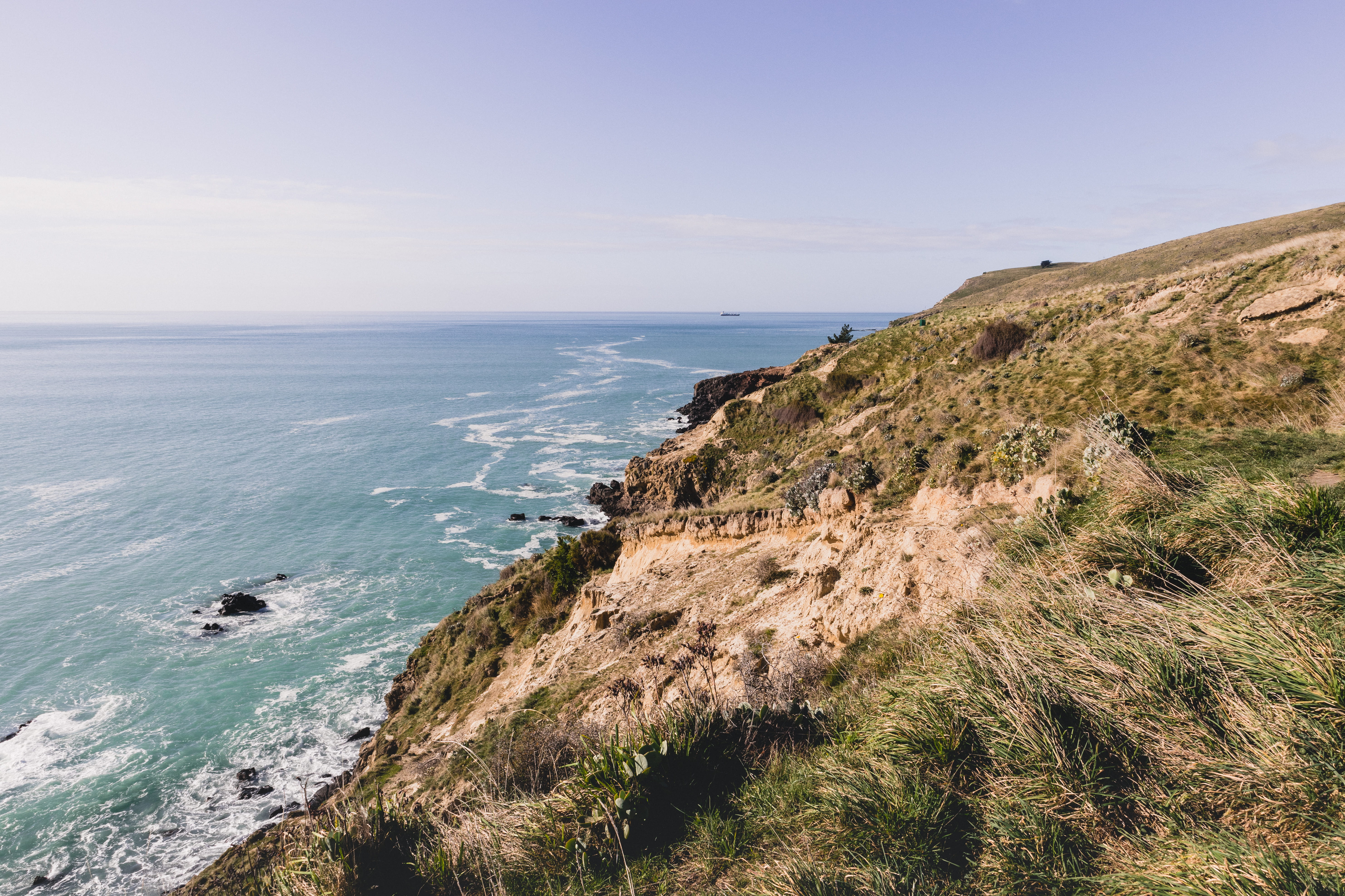 horizon, non-urban scene, new, slope, sea, tranquility, tranquil scene, rocks, beach, land, grass, rocky coastline, plant, green, outdoors, nature, no people, HD Wallpaper
