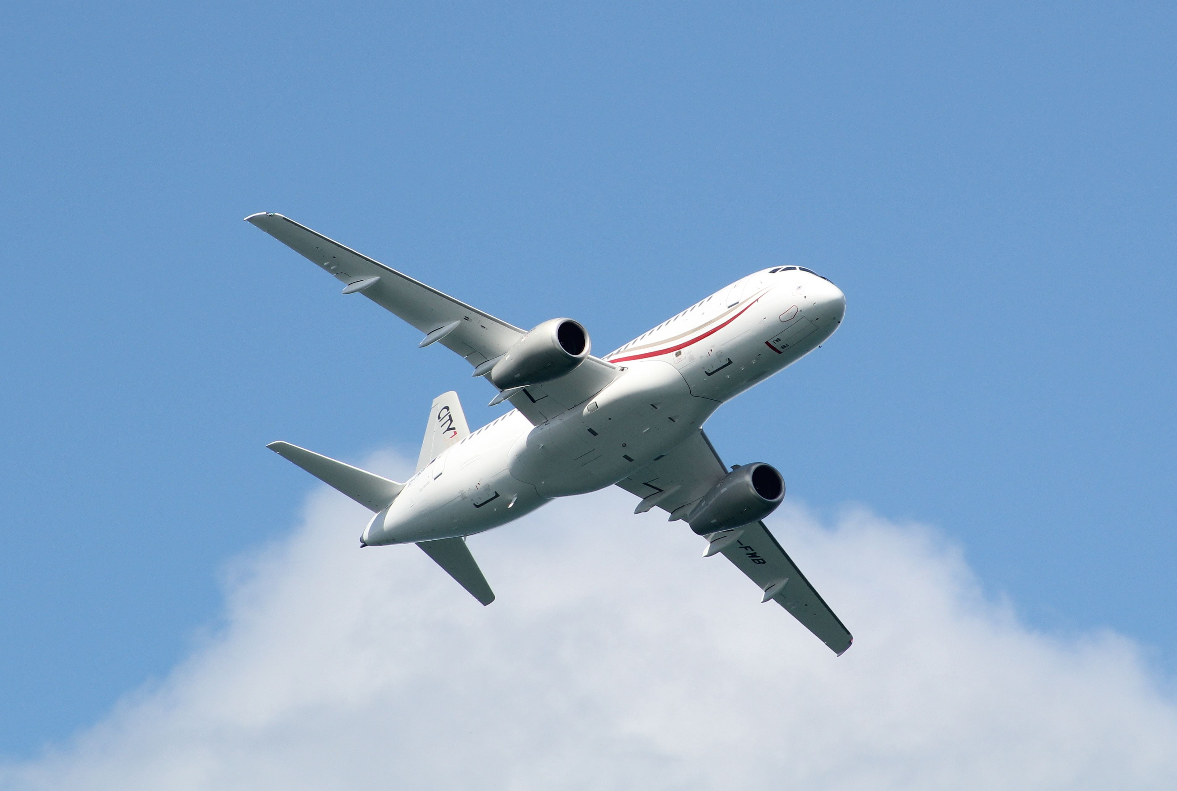air vehicle, the plane, superjet ssj100, airplane, blue, aircraft wing, sky, airliner, cloud - sky, travel, cityjet, commercial airplane, 2K, motion, mode of transportation, HD Wallpaper
