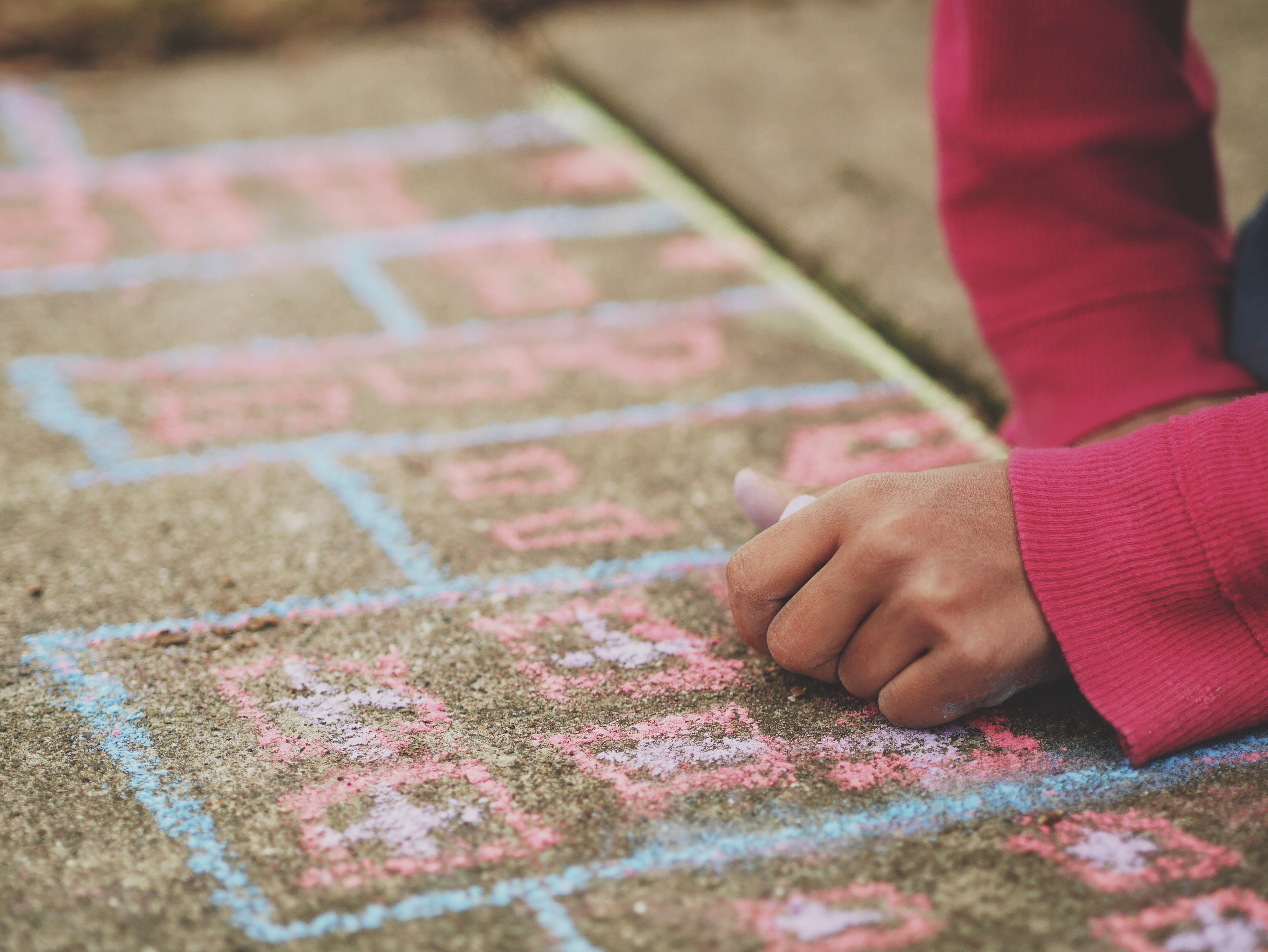 chalk, close-up, pavement, selective focus, child, 4K, casual clothing, low section, rectangle, sidewalk, brown, leisure activity, human hand, play, real people, HD Wallpaper