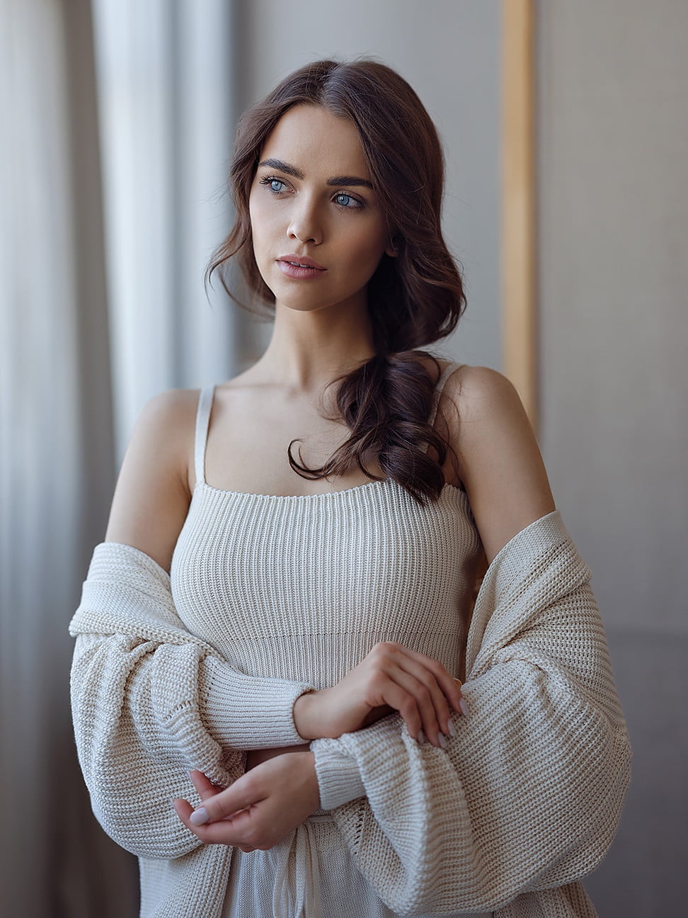 indoors, long hair, sweater, brunette, 720P, women, curly hair, painted nails, blue eyes, looking away, Alexey Kazantsev, Phone HD Wallpaper