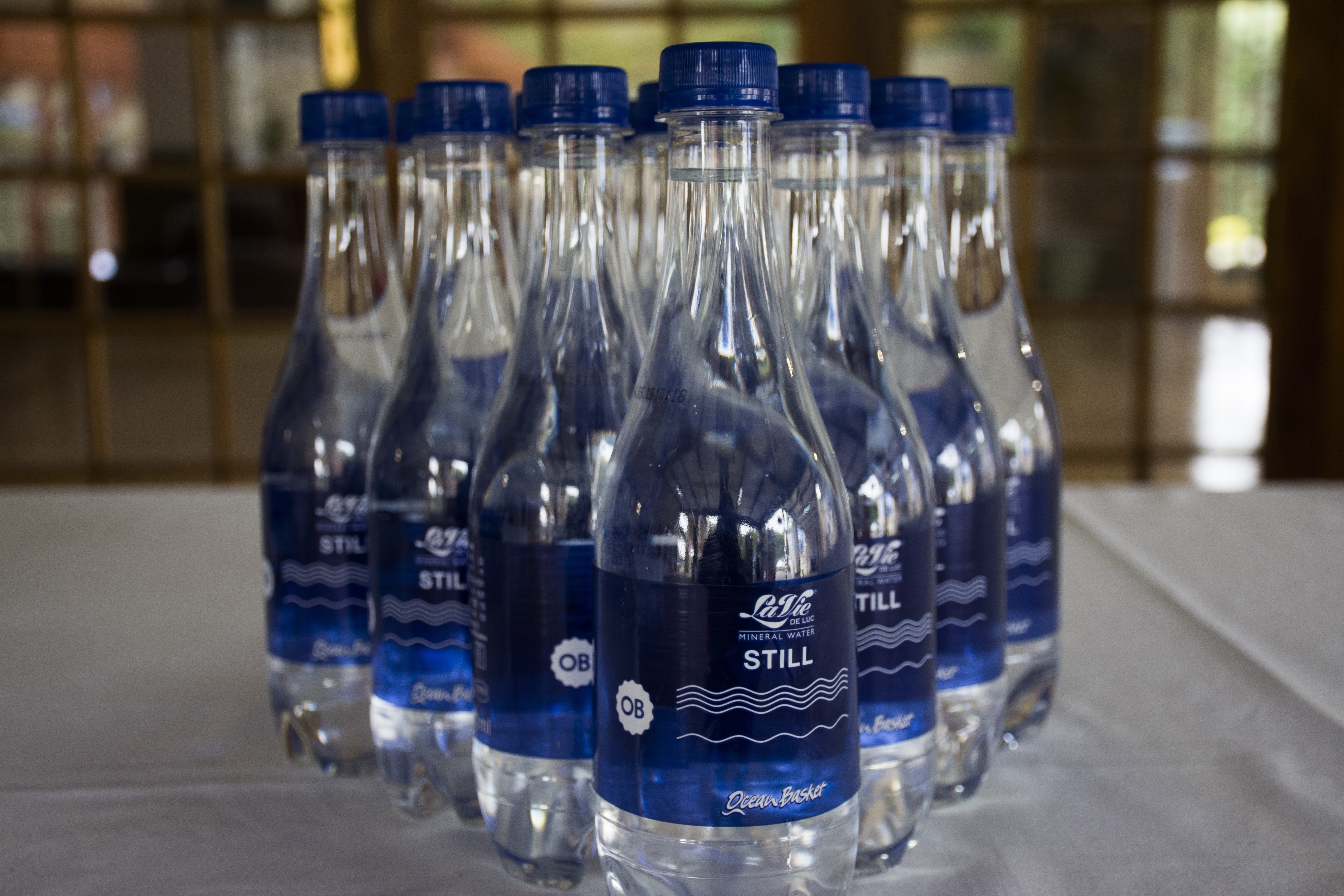 water bottle, container, transparent, label, focus on foreground, food and drink, no people, blue, drink, 5K, indoors, refreshment, still life, text, clean, HD Wallpaper