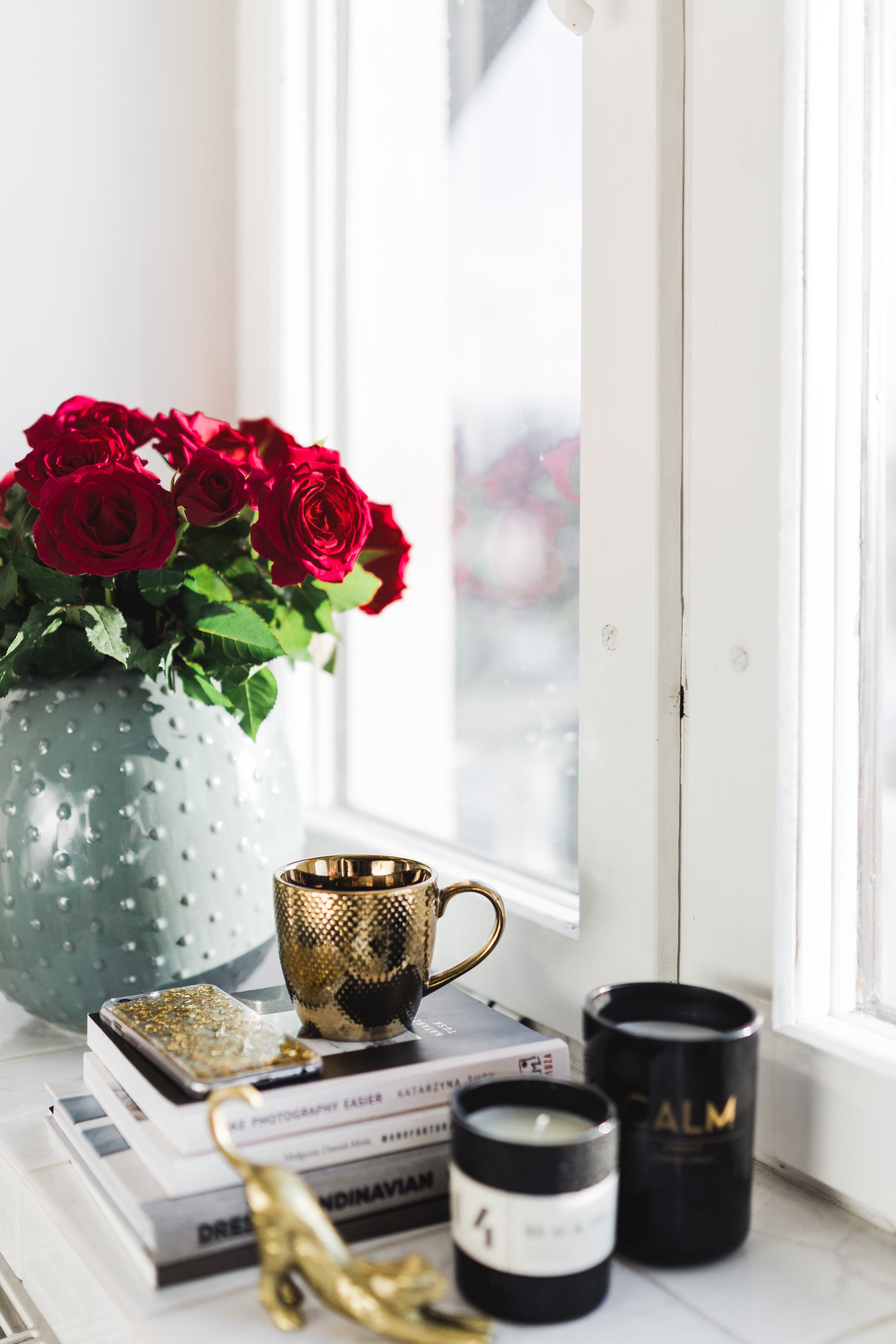 flowering plant, vase, essentials, no people, candles, rose - flower, home interior, beauty in nature, bouquet, glass - material, interior, 4K, still life, Phone HD Wallpaper