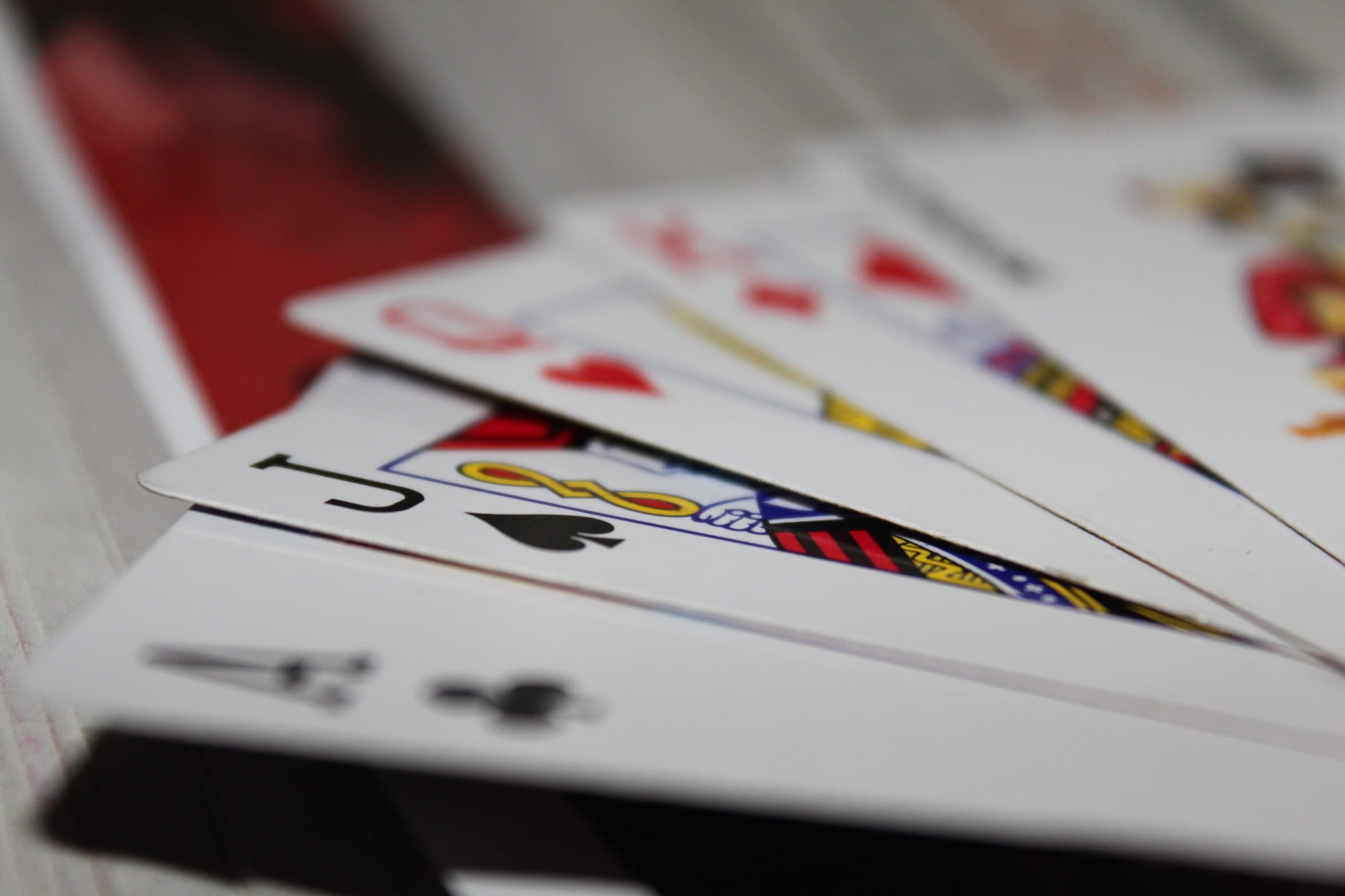poker, arts culture and entertainment, red, photography, luck, competition, cards, casino, close-up, leisure games, indoors, 1080P, opportunity, playing cards, HD Wallpaper