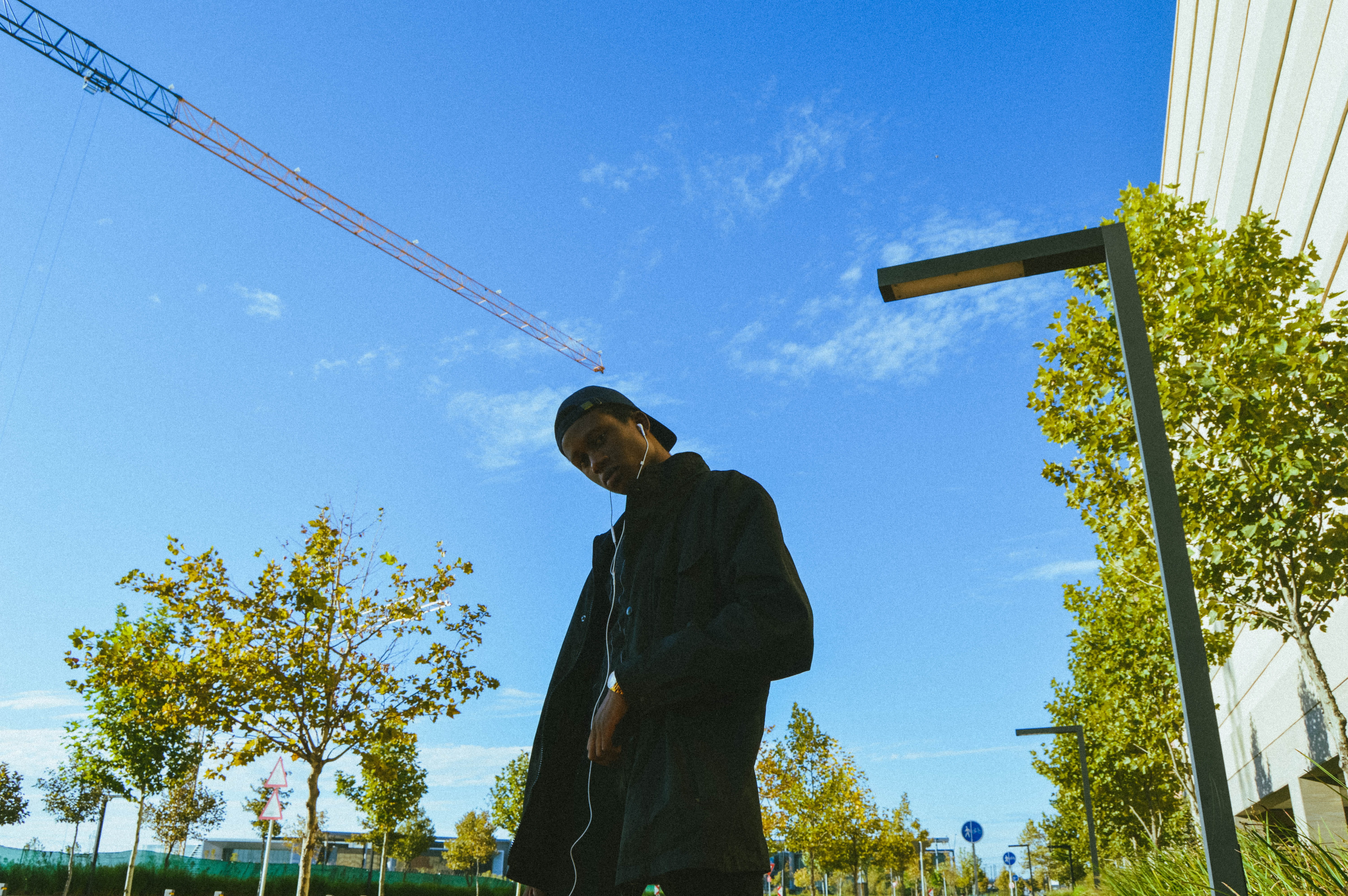 jacket, clothing, cloud - sky, overcoat, 5K, three quarter length, symbol, sky, blue, low angle view, one person, accessories, leisure activity, pants, HD Wallpaper